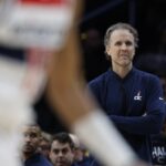 Washington Wizards interim head coach Brian Keefe watches from the bench against the Utah Jazz in the first half at Capital One Arena.