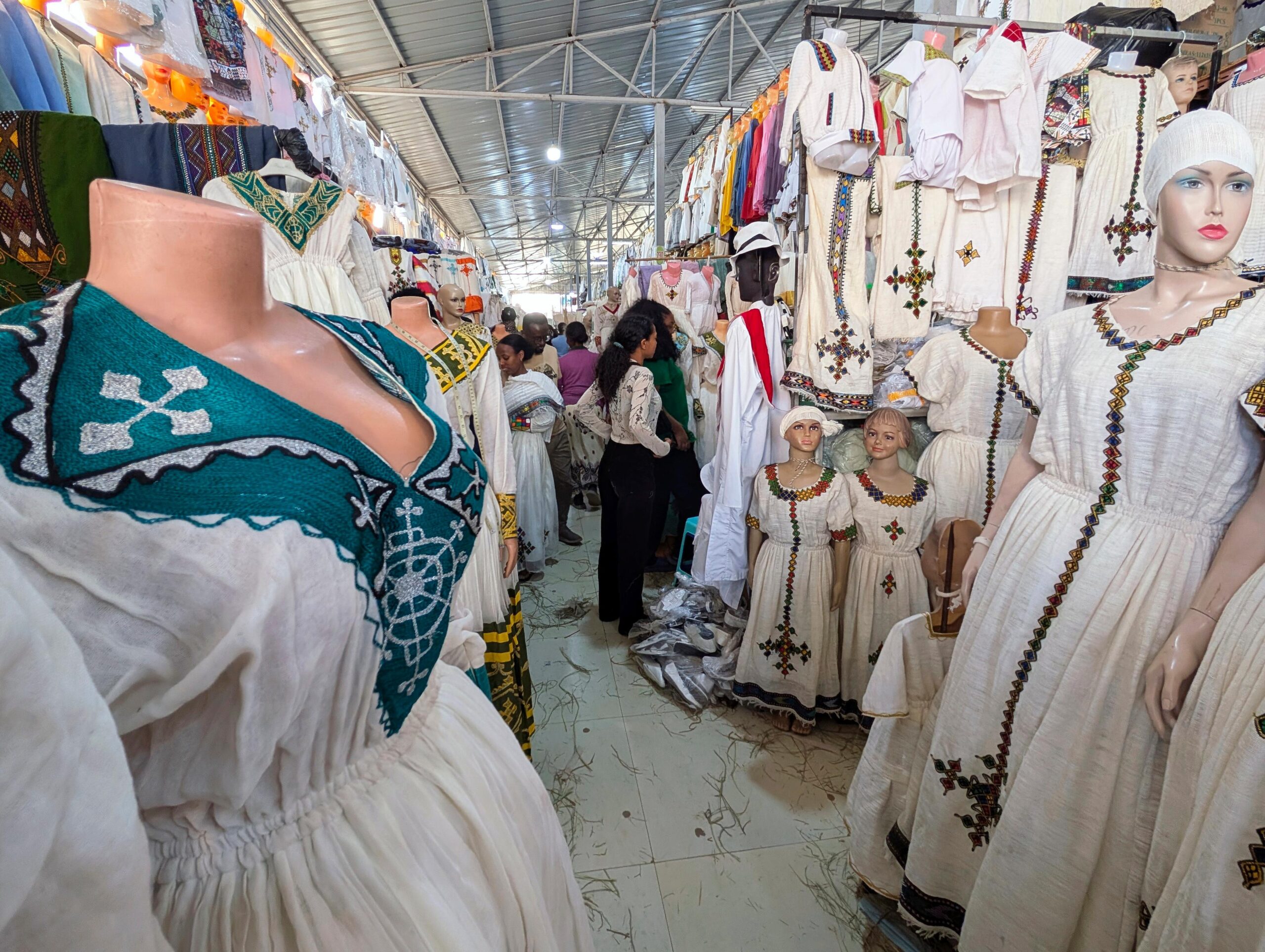 In this photo provided by Nicole Evatt, traditional Ethiopian dresses...