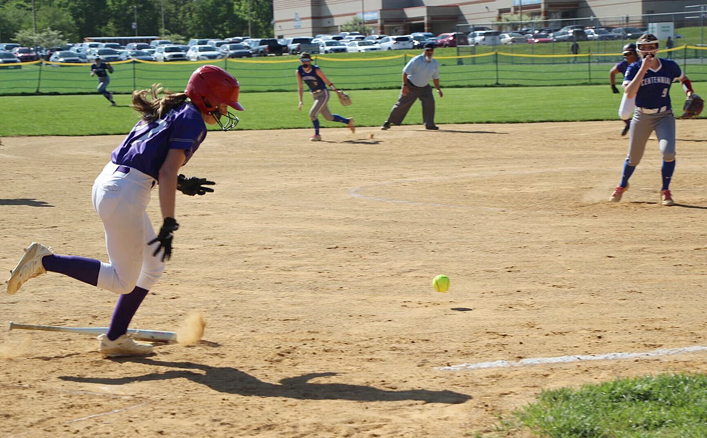 Long Reach’s Abby Richardson runs toward first as Centennial’s Lauren...