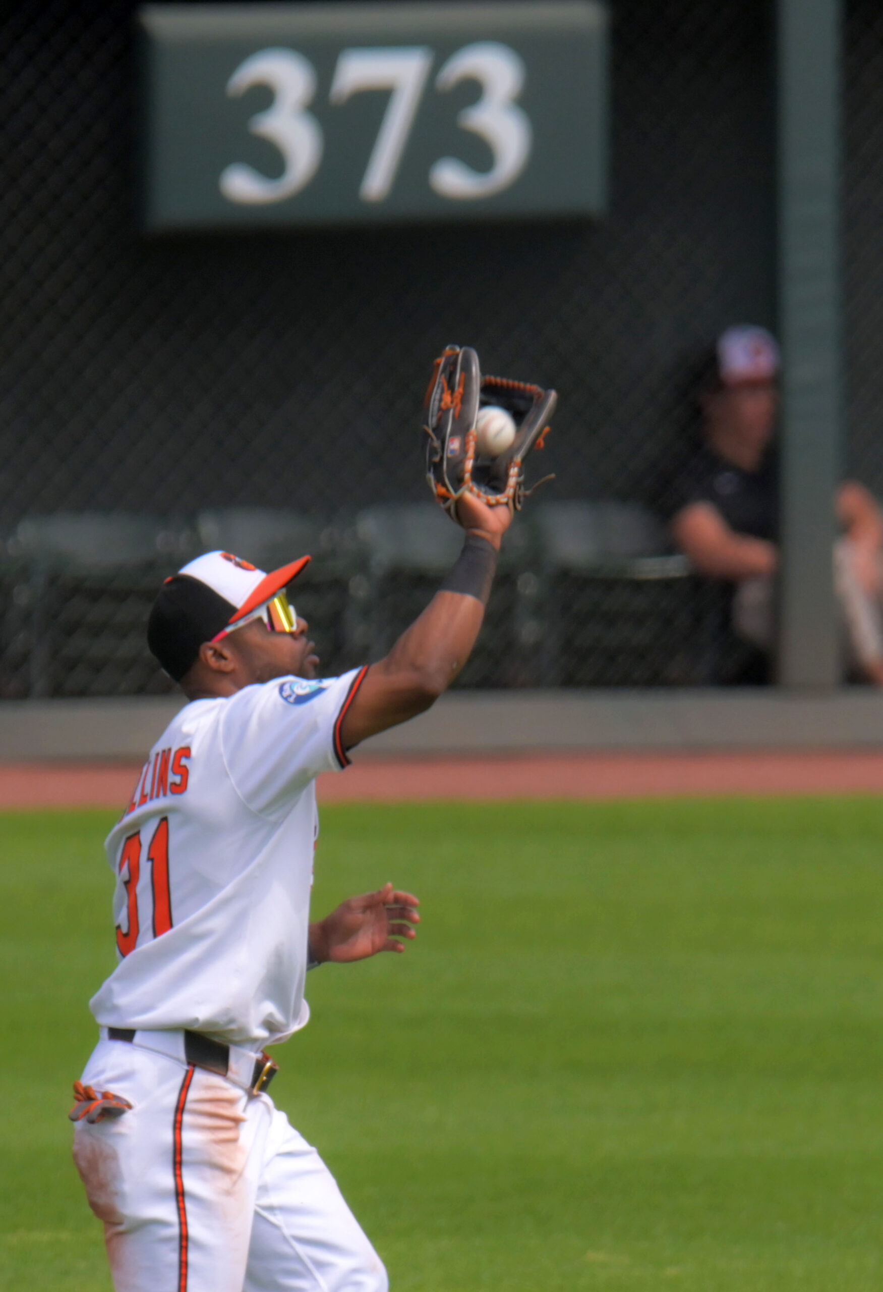 Baltimore Orioles center fielder Cedric Mullins catches a fly ball...
