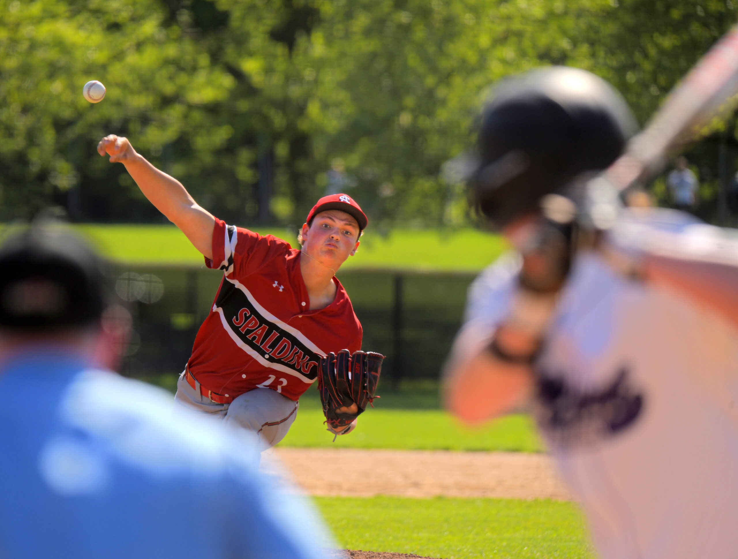 Archbishop Spalding Cavaliers starting pitcher Peyton Mamula uncorks a pitch...