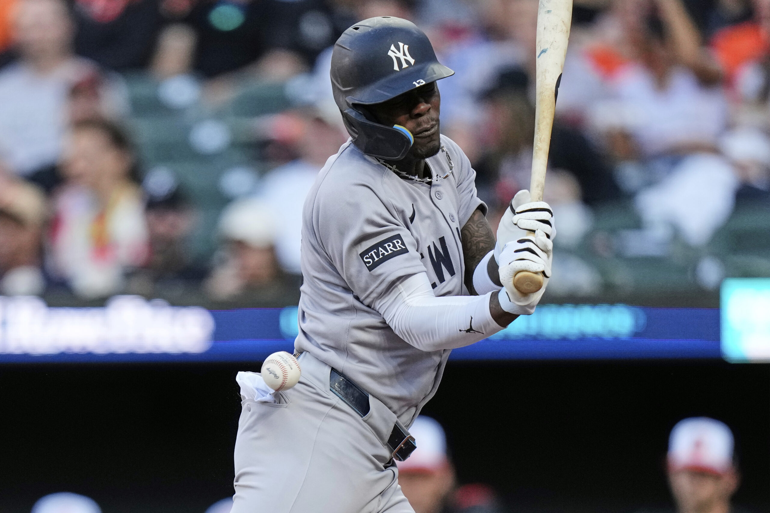 New York Yankees' Jazz Chisholm Jr. is hit by a...