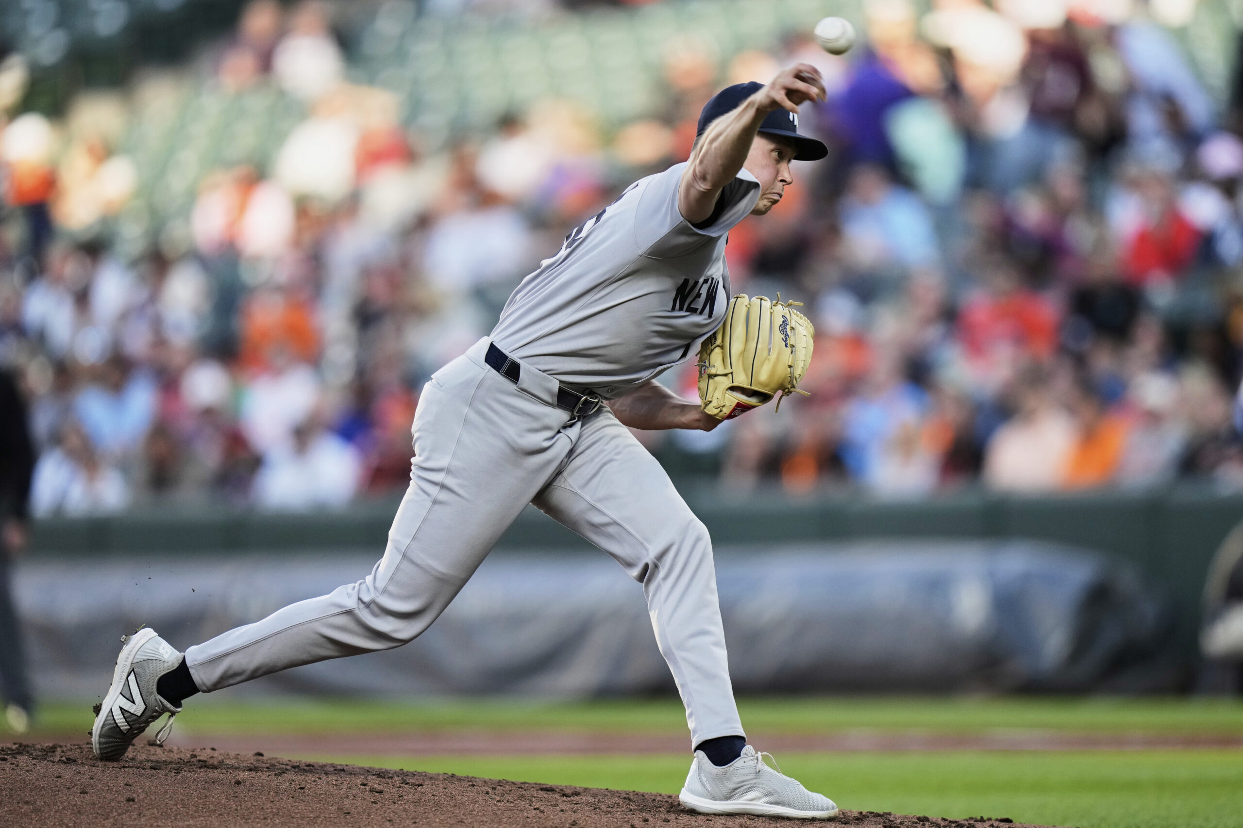 New York Yankees starting pitcher Will Warren delivers during the...
