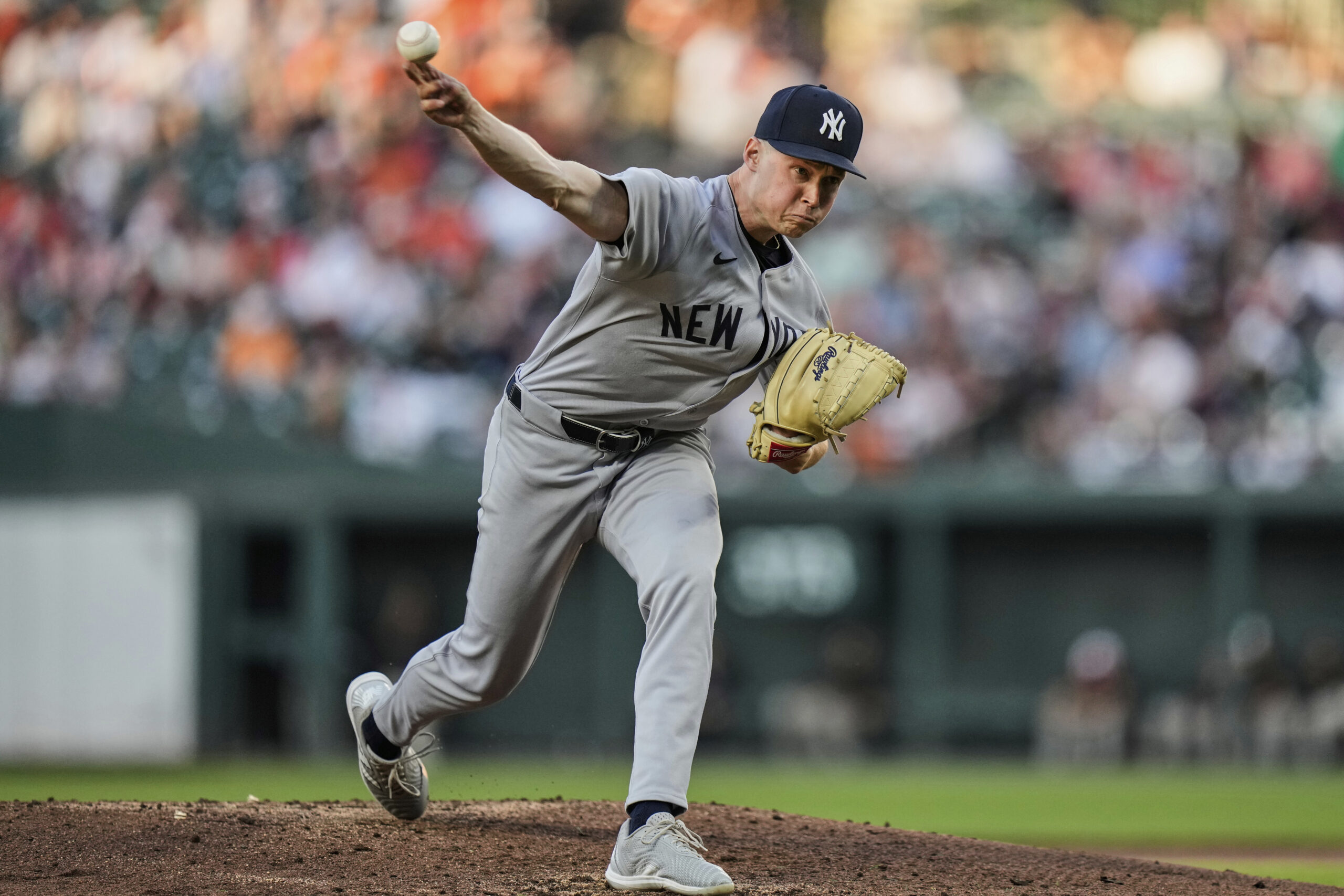 New York Yankees starting pitcher Will Warren delivers during the...