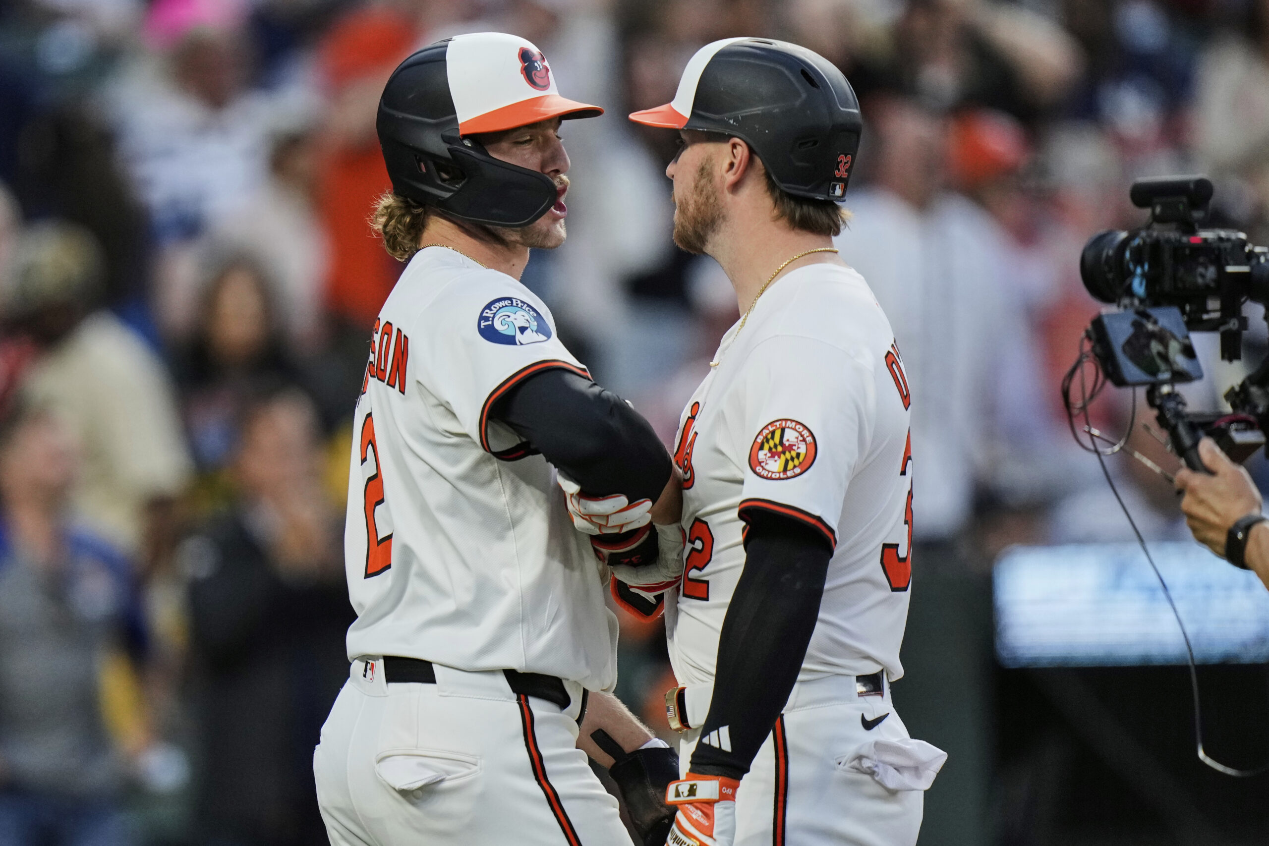 Baltimore Orioles' Ryan O'Hearn, center right, celebrates with Gunnar Henderson...