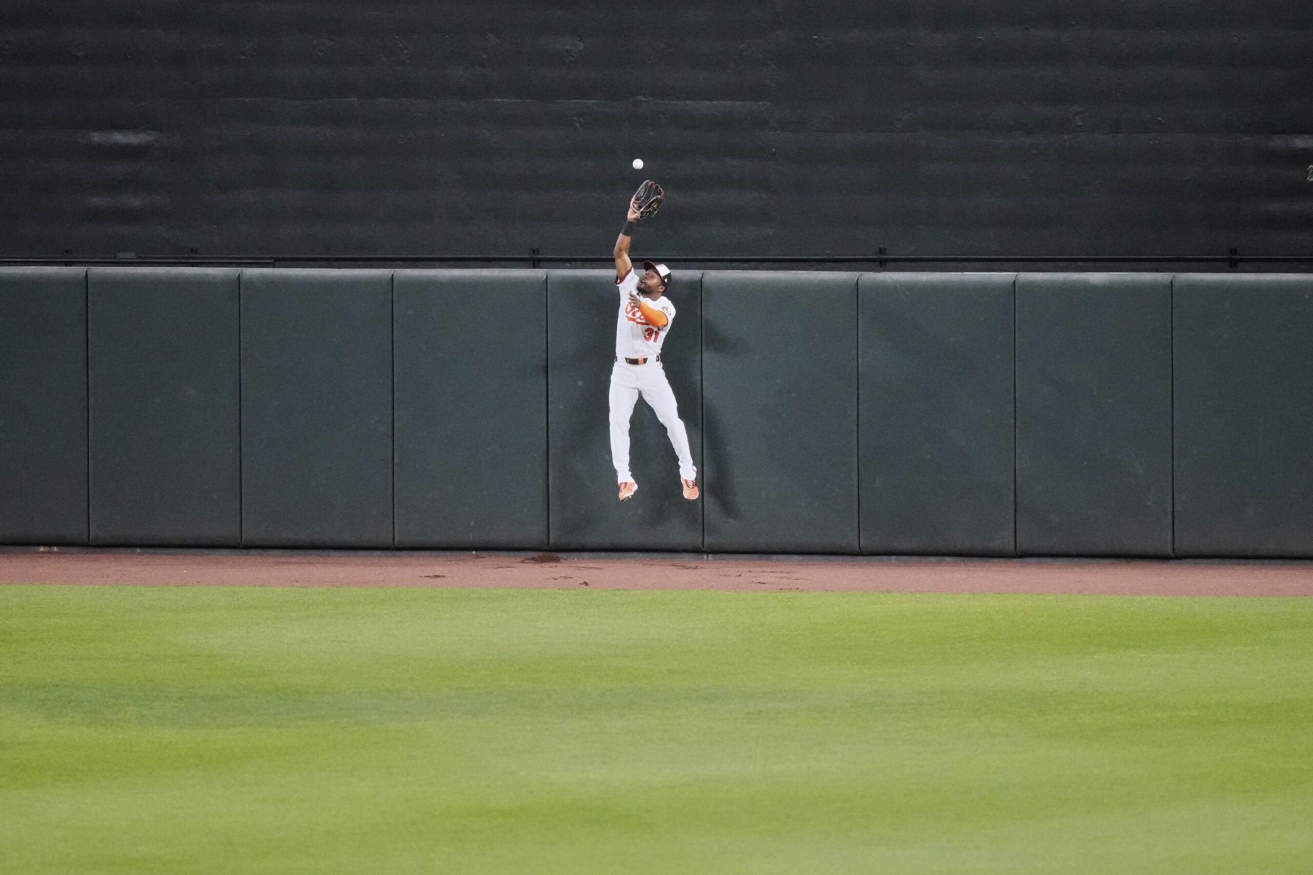 Orioles center fielder Cedric Mullins robs Yankees first baseman Paul...