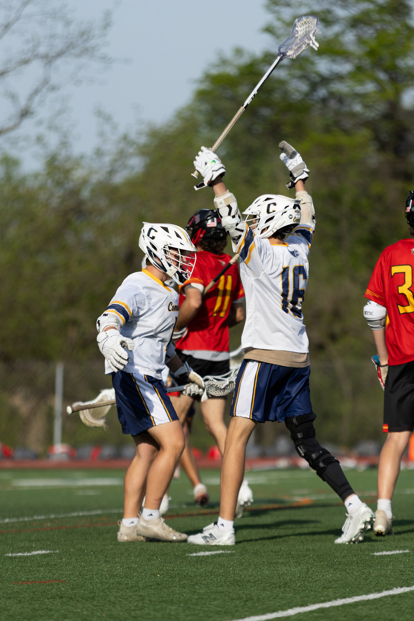 Catonsville’s Isaak Powell, right, celebrates with Zack Berlin after scoring...