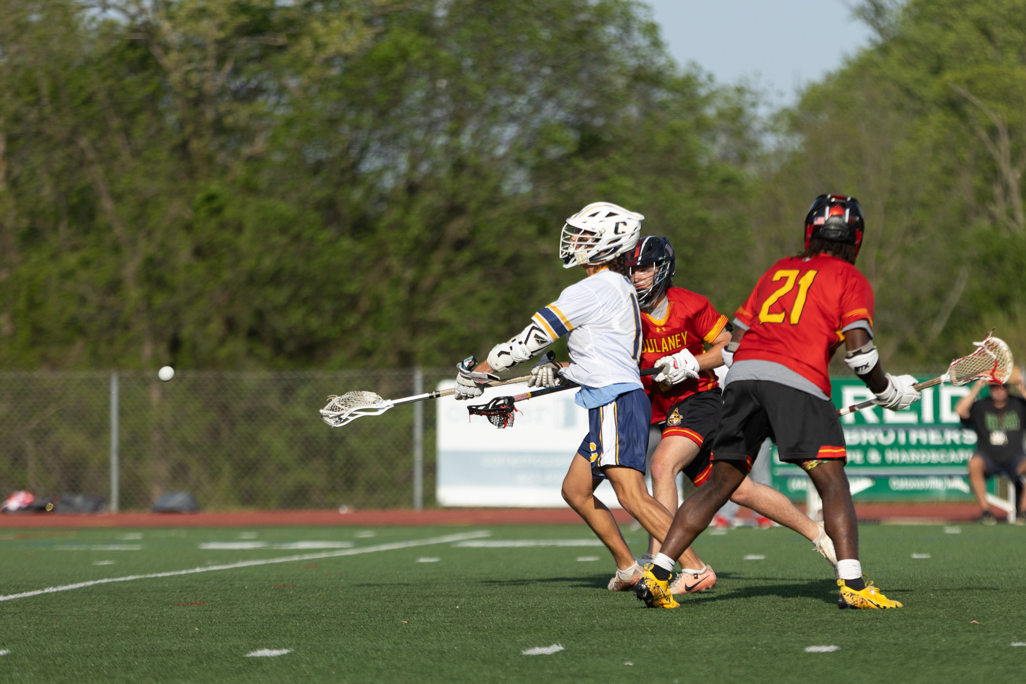 Catonsville’s Zack Berlin fires off a shot through Dulaney defense...