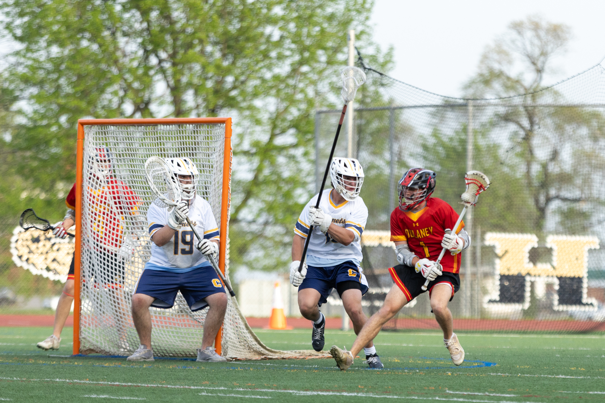 Dulaney’s Ryan Dannenfelser looks for a gap in the Catonsville...