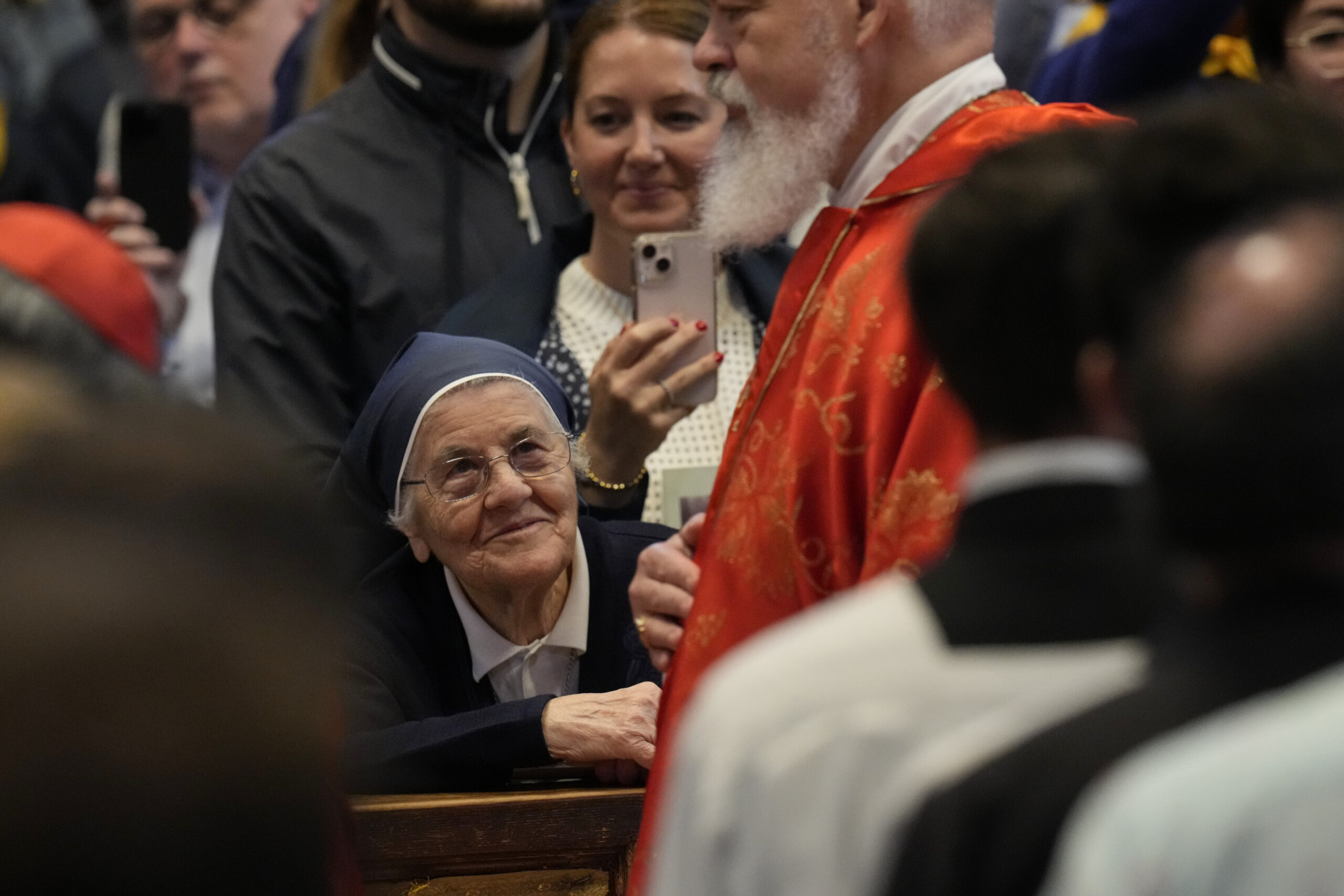 A nun looks at Cardinal Dominique Joseph Mathieu