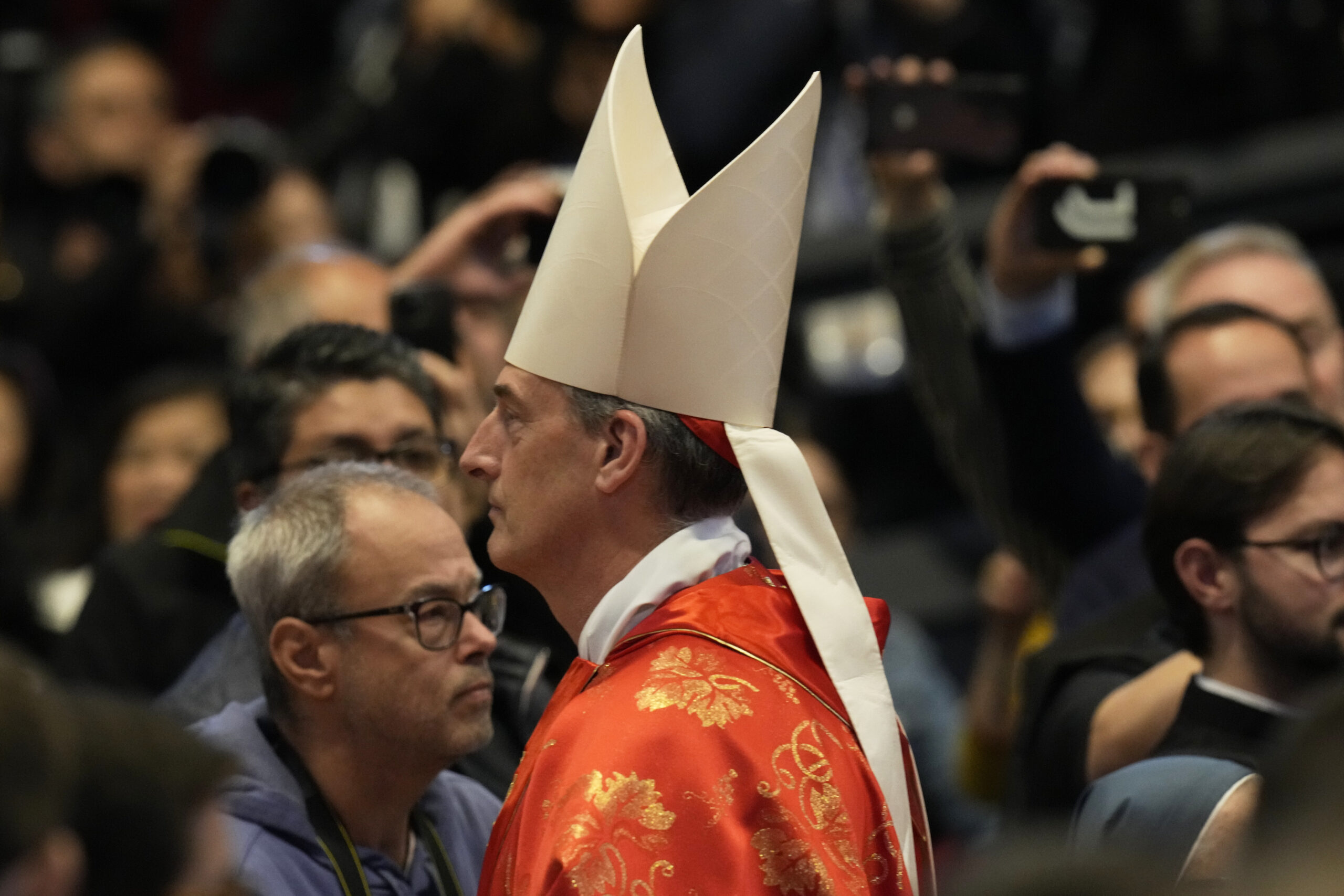 Cardinal François-Xavier Bustillo attends a final Mass