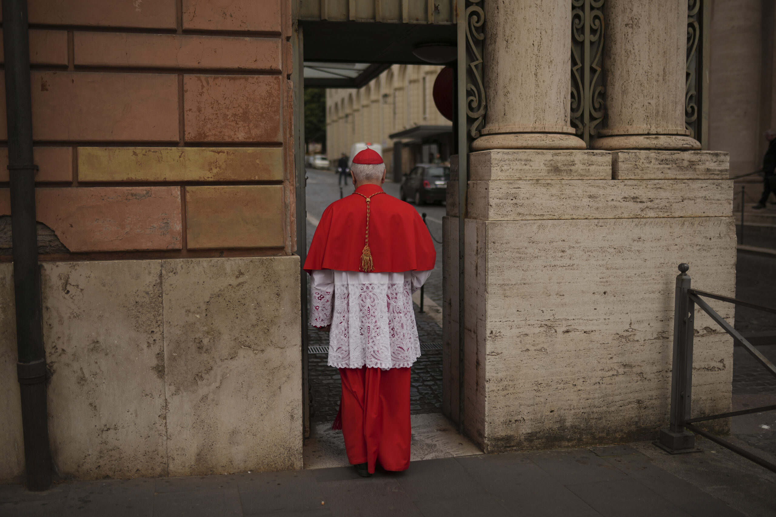 Cardinal Giuseppe Versaldi walks through the St. Anna gate