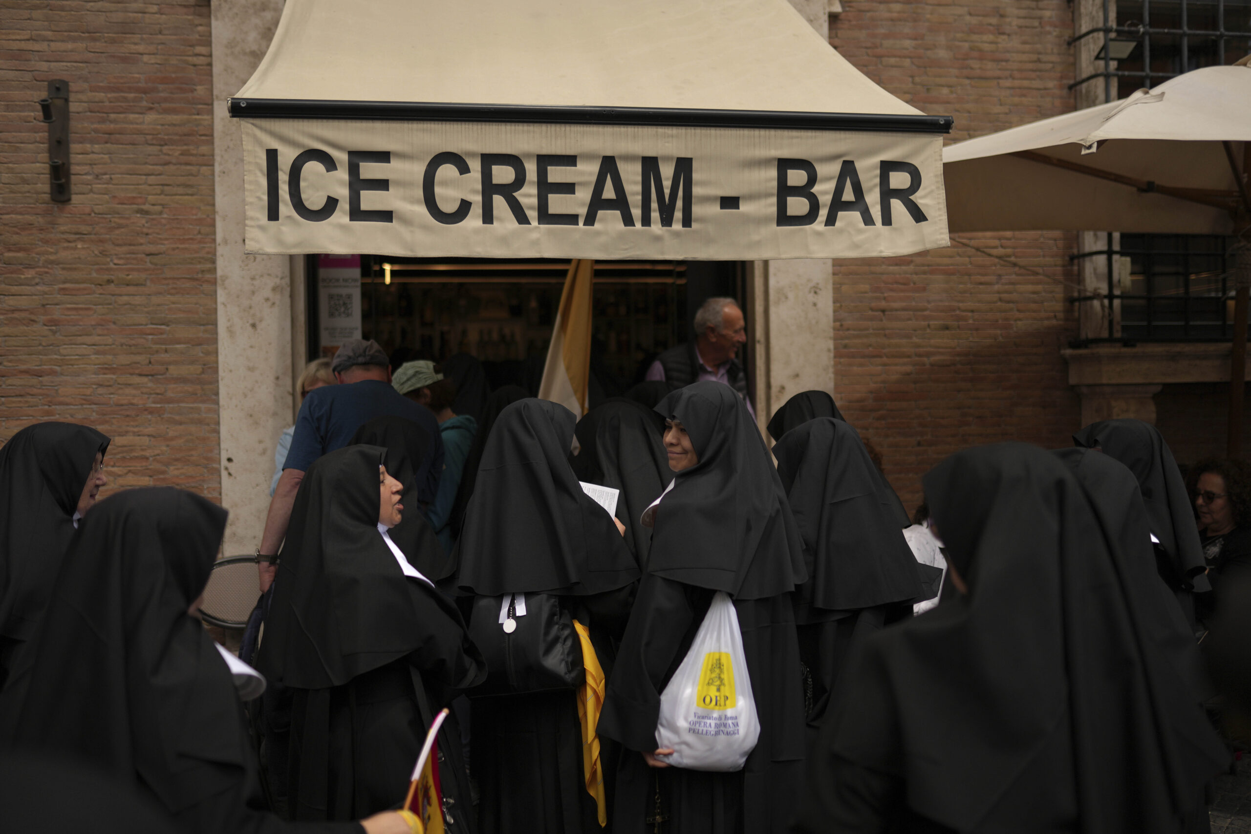 Nuns enter an ice cream coffee bar