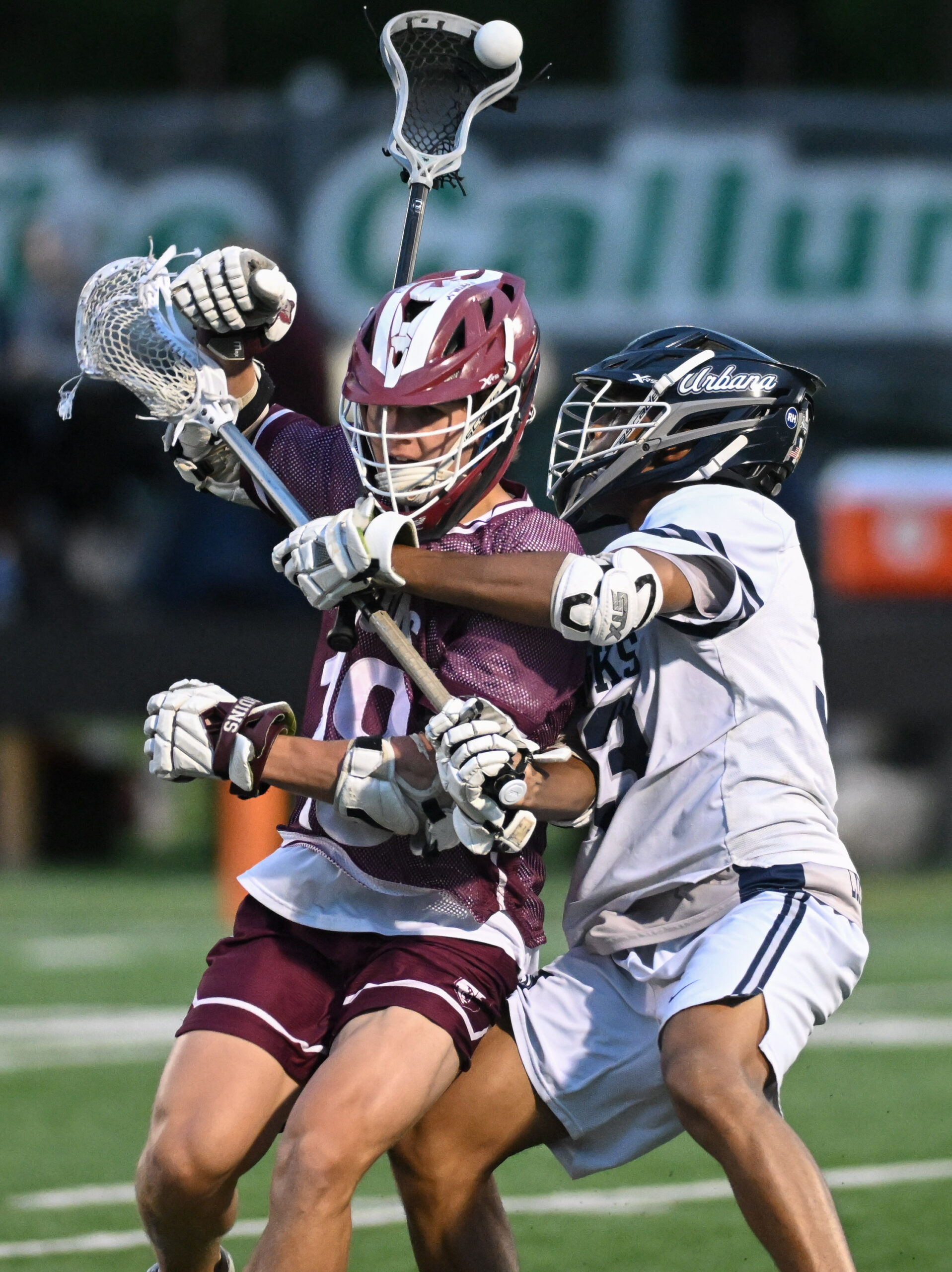 Broadneck’s Aiden Gillette, left, draws a foul from Urbana’s Jayden...