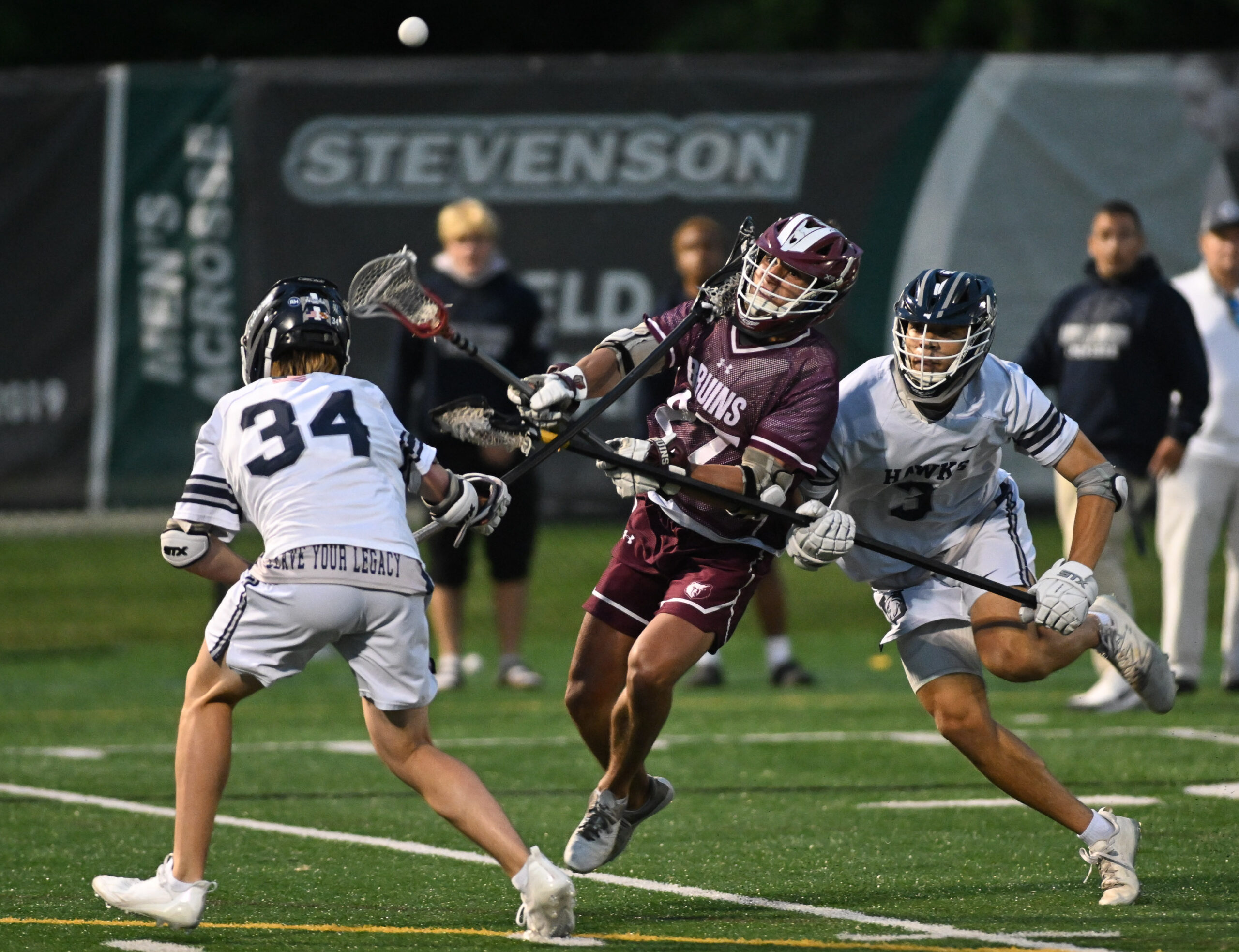 Broadneck’s Brayden Schmidt, center, shoots against Urbana’s Tommy Gotlinger, left,...
