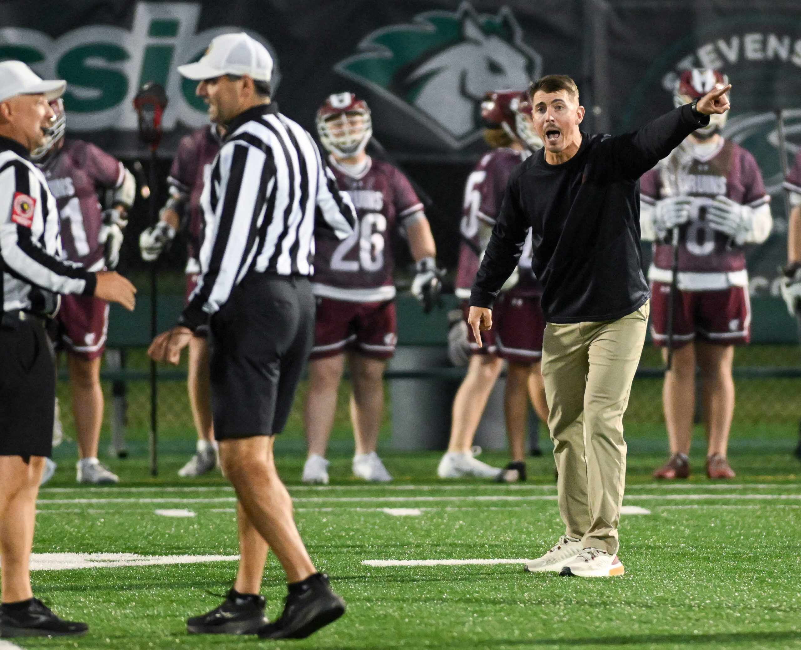 Broadneck head coach Jeff McGuire works the officials during the...