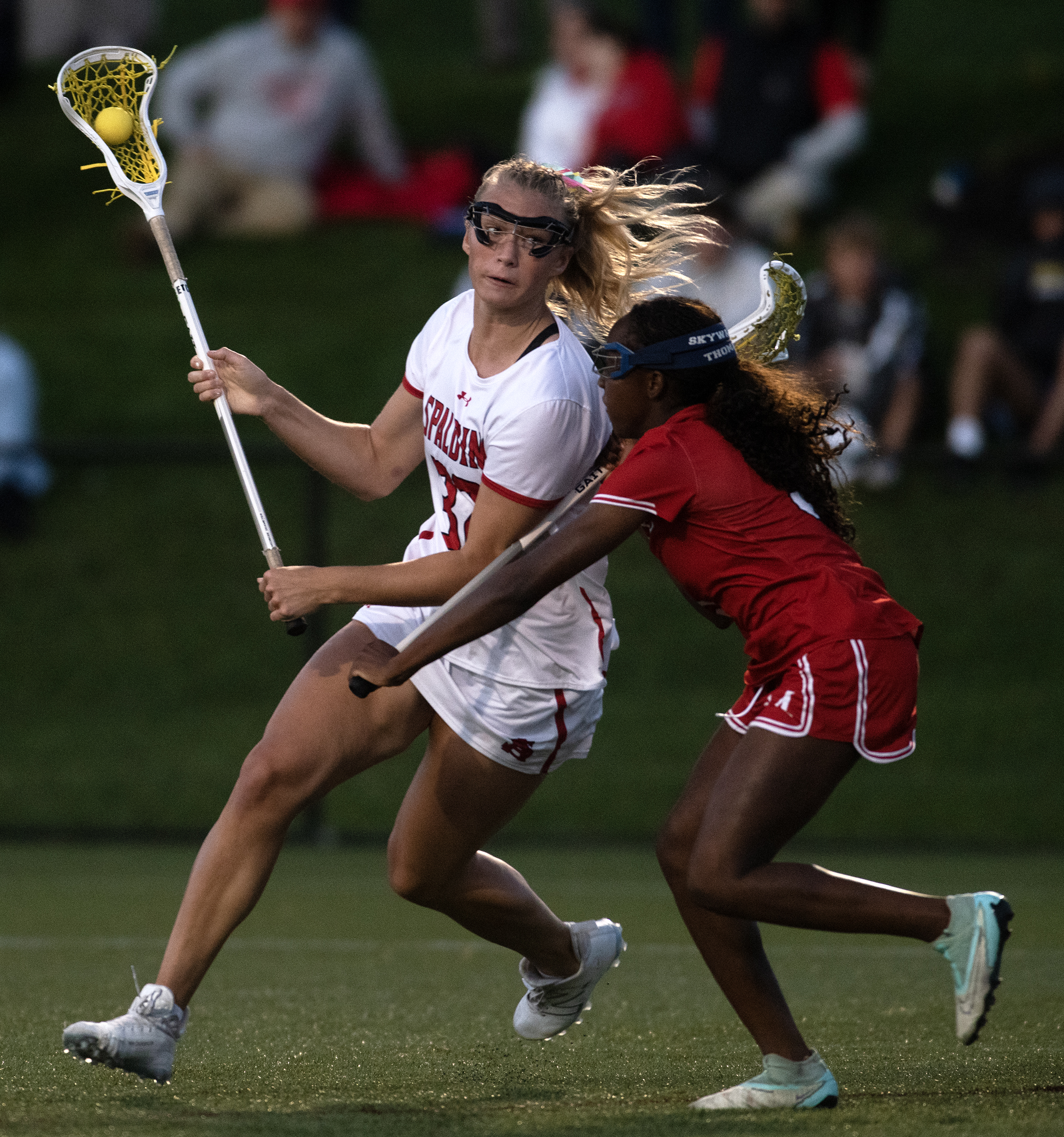 May 9, 2025-Spalding’s Ellie Roberts carries the ball against Maryvale’s...