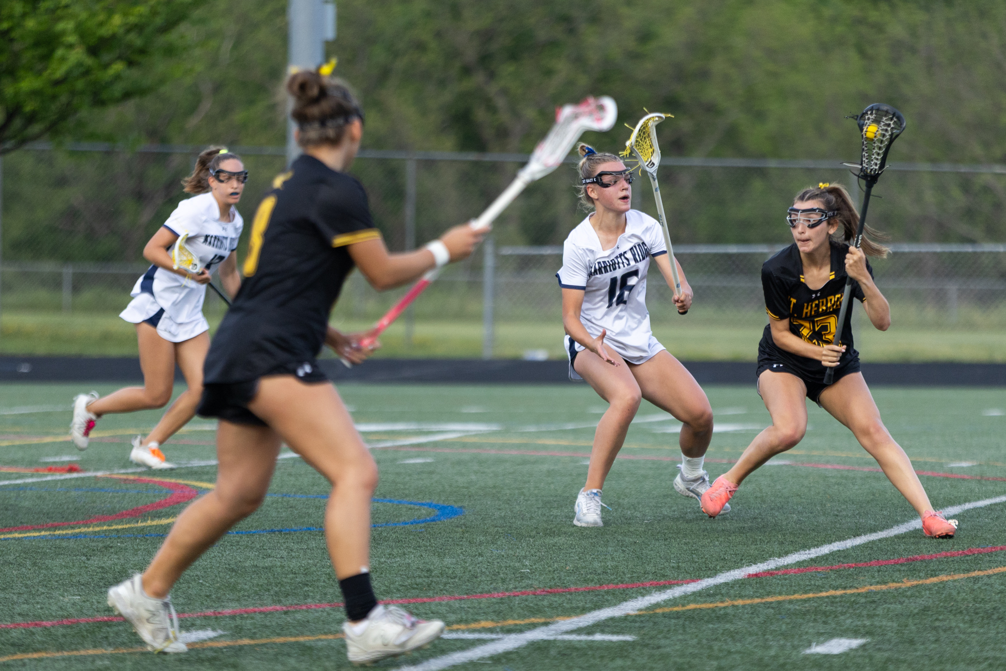 Maria Brogno looks for an opening to move downfield during...