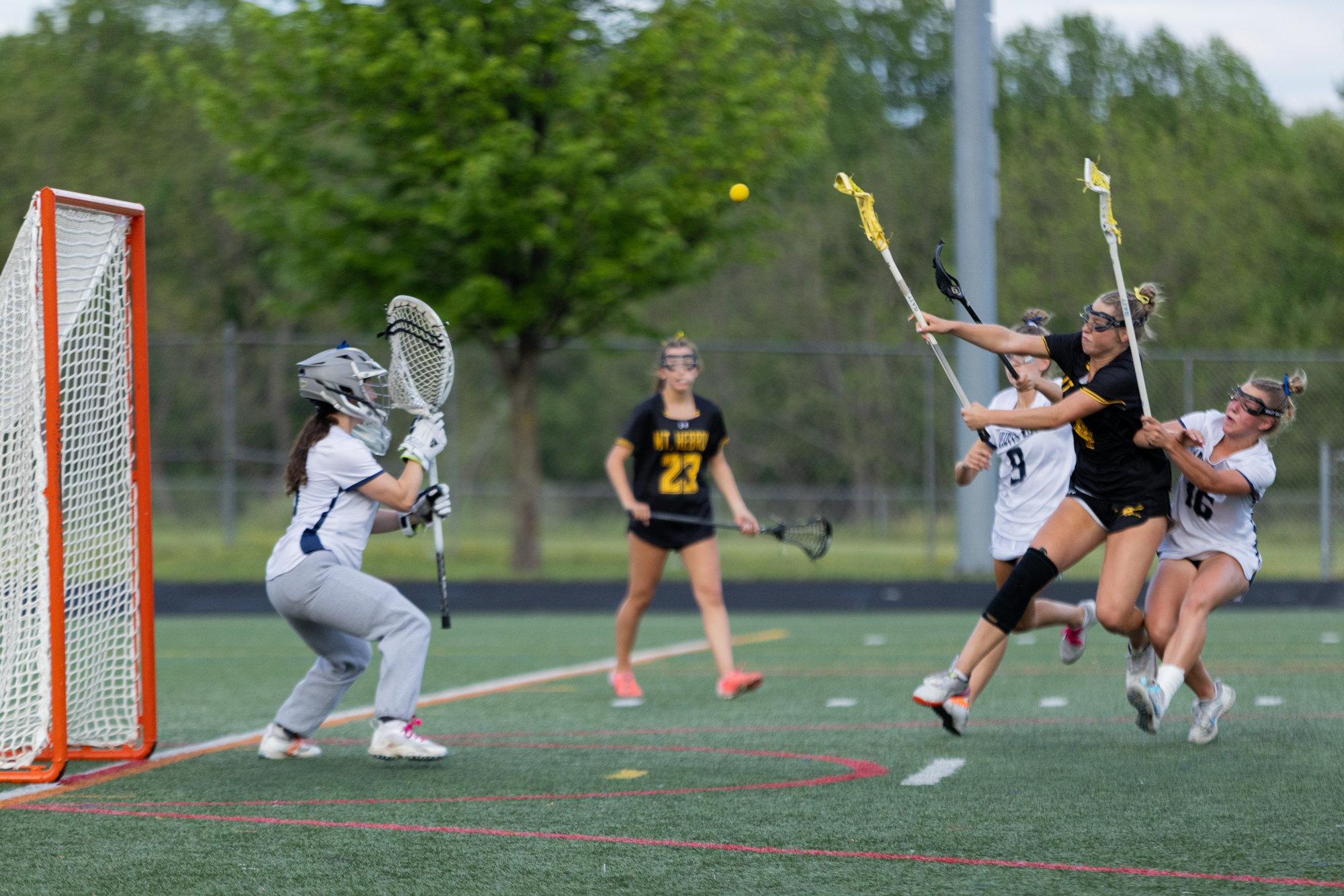 Mt. Hebron’s Kaitlyn Magdar fires a shot through traffic during...