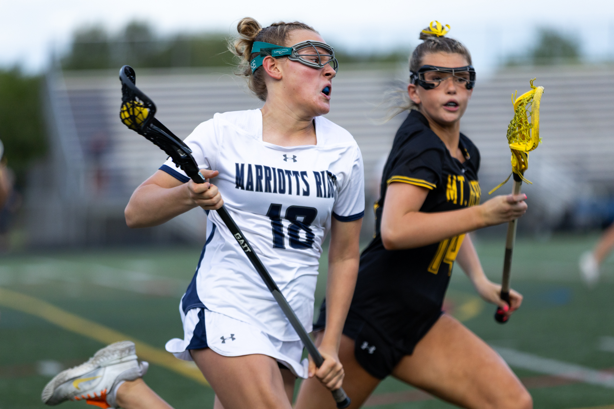 Marriotts Ridge’s Colbie VanTine carries the ball downfield against Molly...