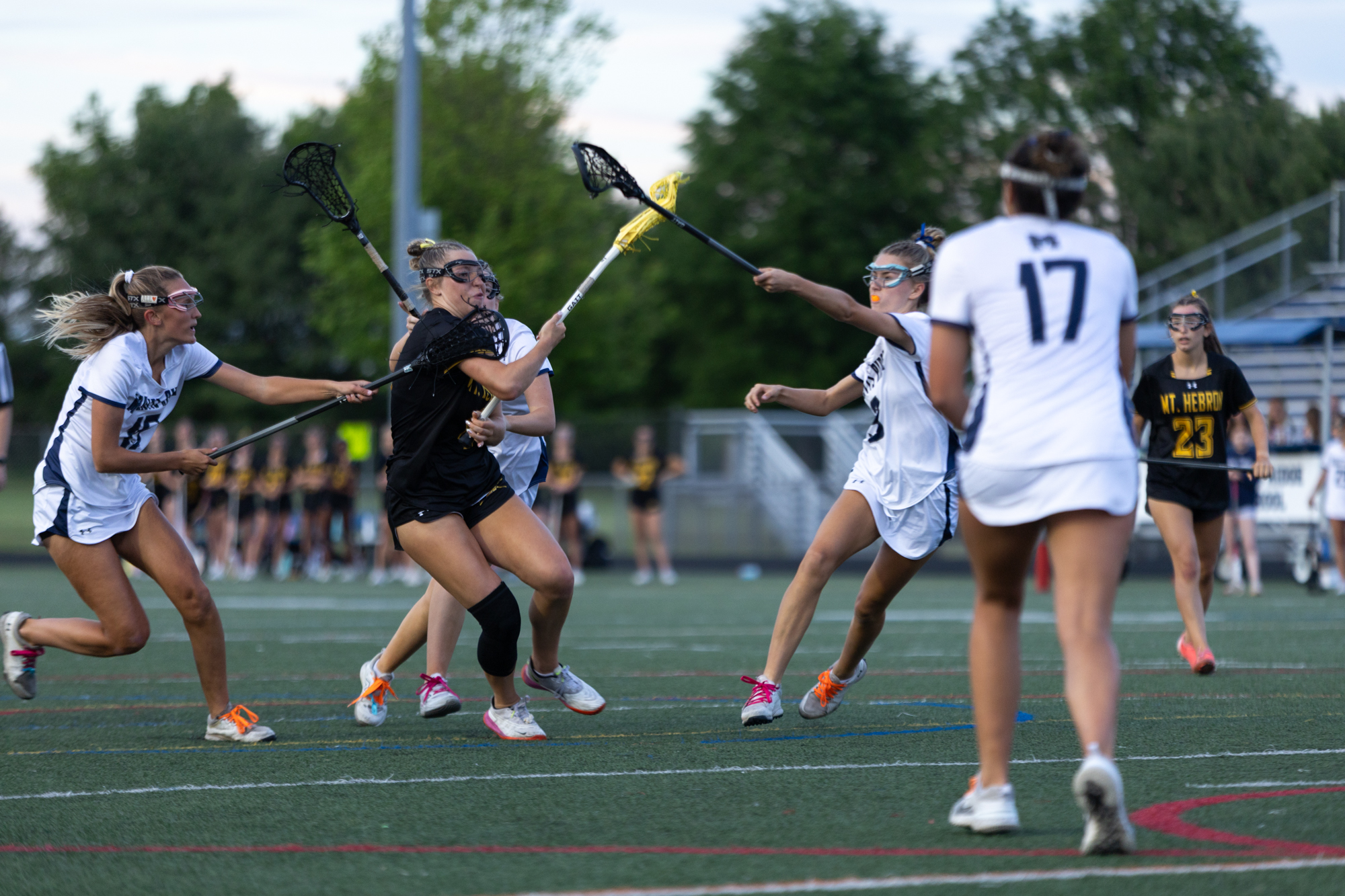 Mt. Hebron’s Kaitlyn Magdar attempts to fire a shot through...