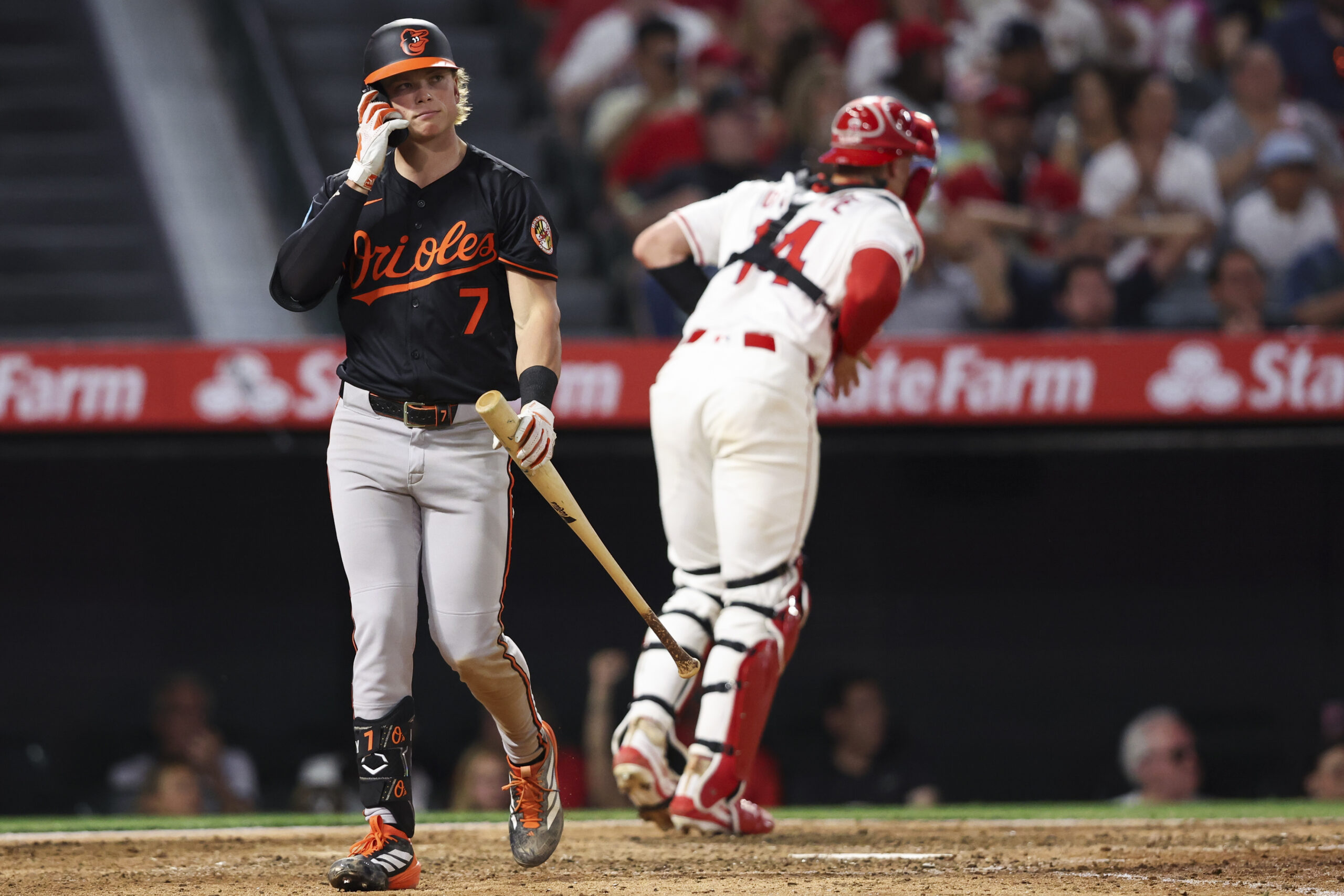 Baltimore Orioles' Jackson Holliday (7) reacts after striking out as...