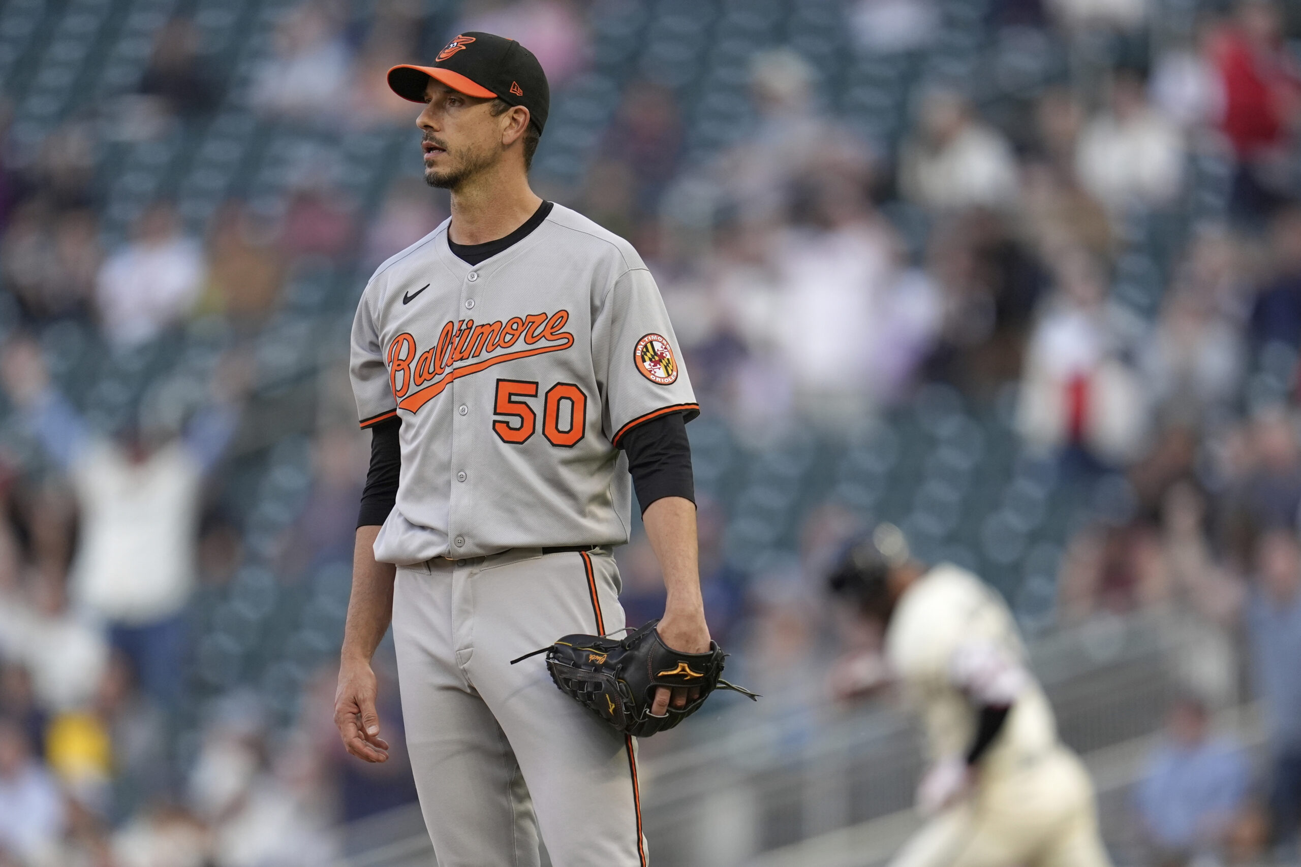 Baltimore Orioles starting pitcher Charlie Morton (50) stands on the...