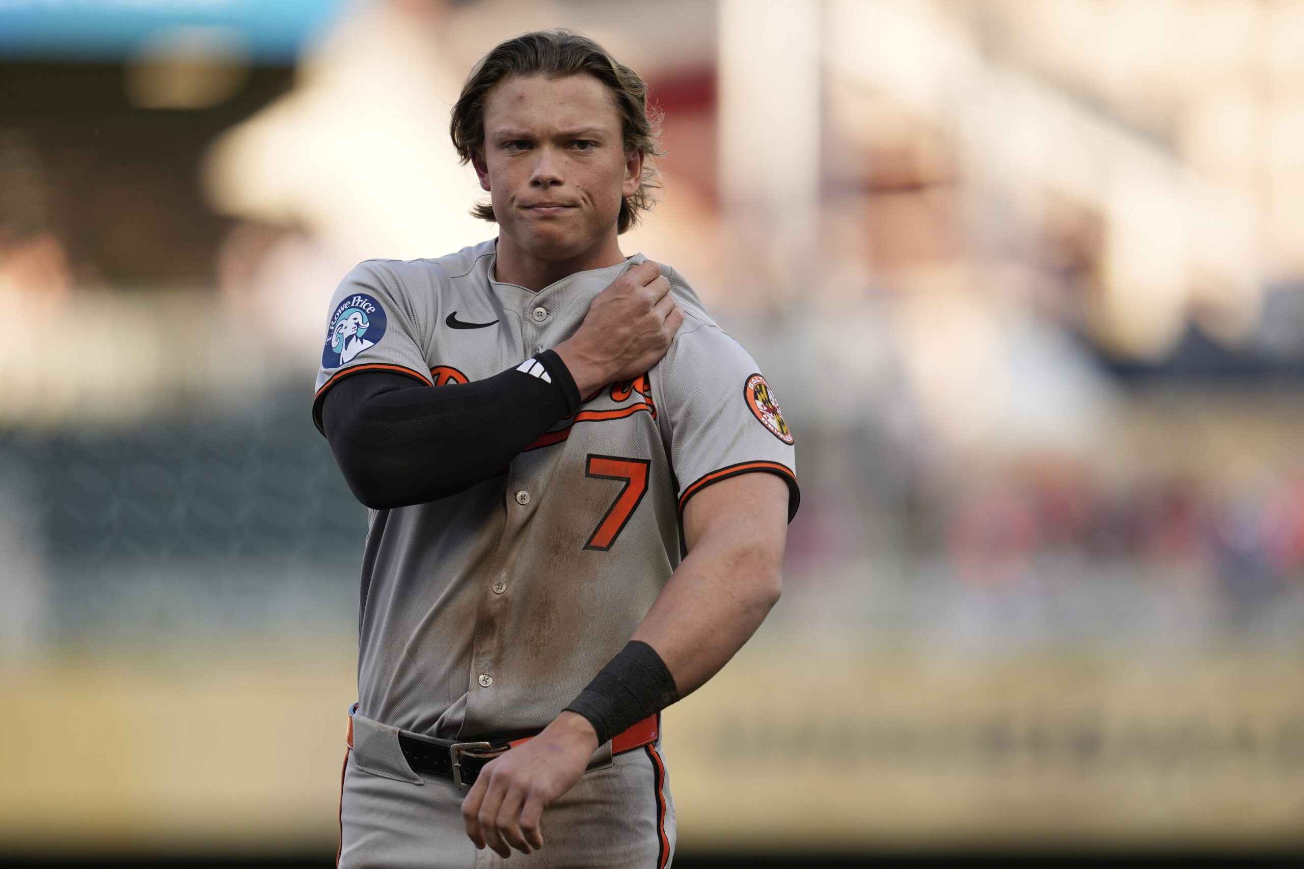 Baltimore Orioles' Jackson Holliday (7) walks back to the dugout...