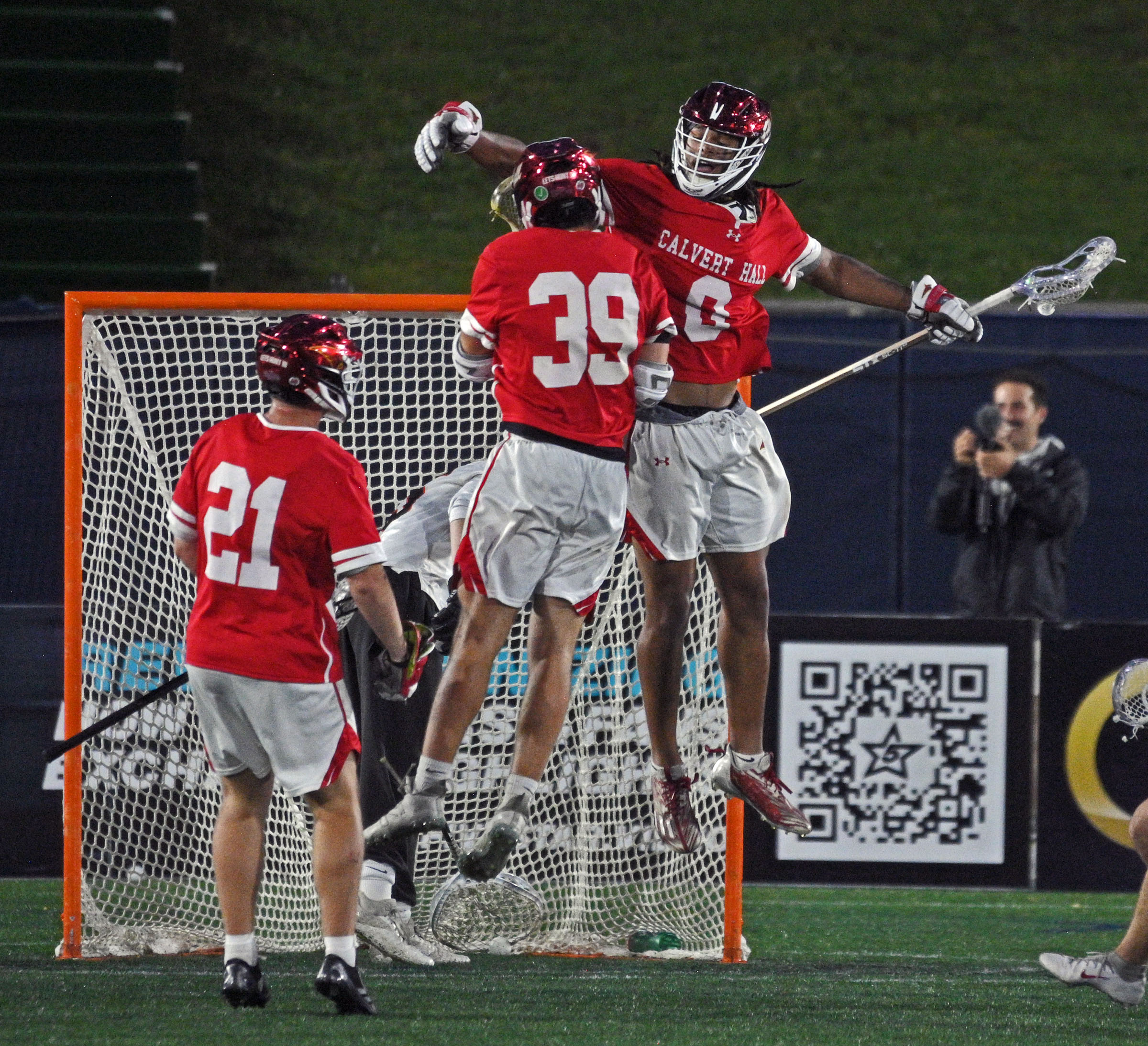 Calvert Hall’s Jermaine Anderson, from right, celebrates his goal against...