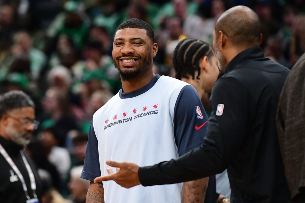 Washington Wizards guard Marcus Smart (36) smiles during a timeout in the first half again the Boston Celtics at TD Garden.