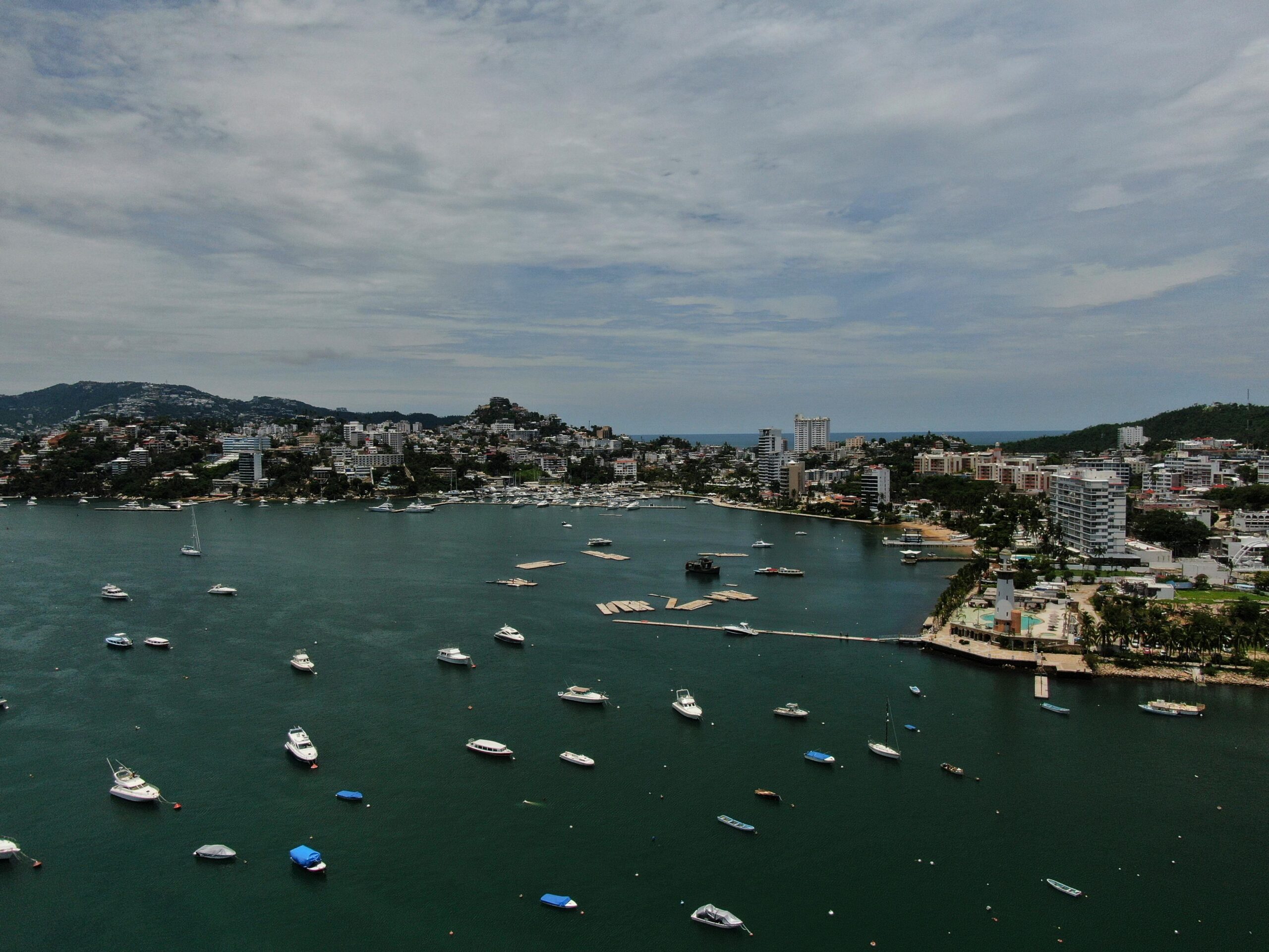 Boats are anchored near Manzanillo beach to be removed from...