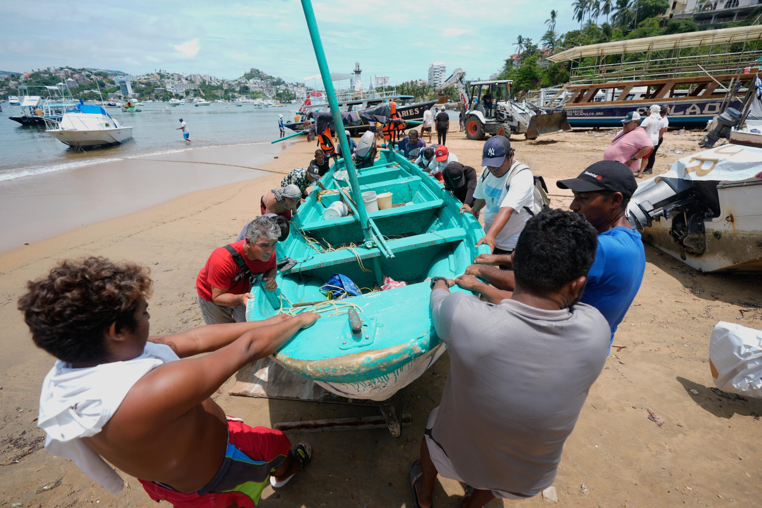 Boats are removed from the water to Manzanillo beach ahead...