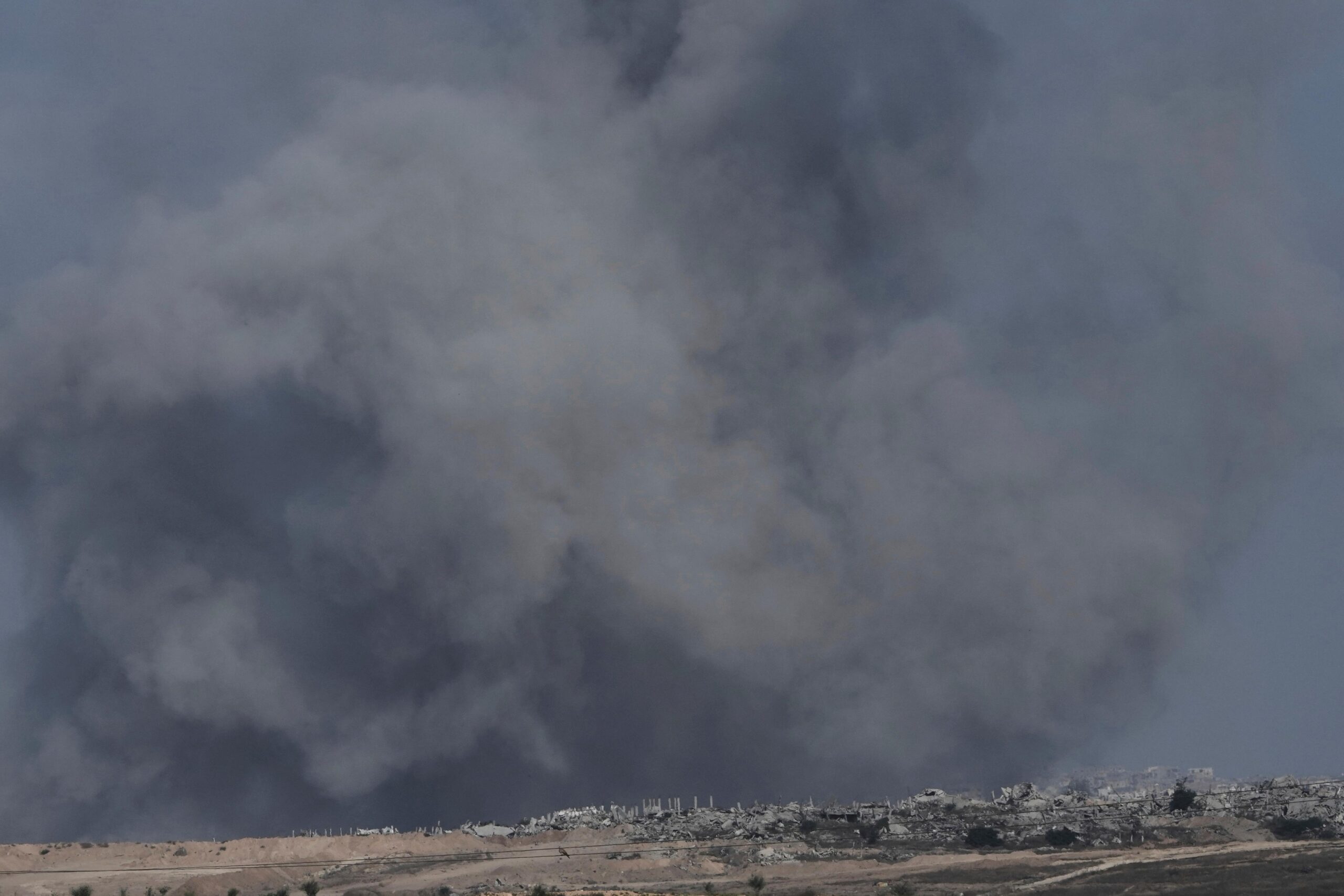 Smoke from Israeli bombardment of the northern Gaza Strip near...