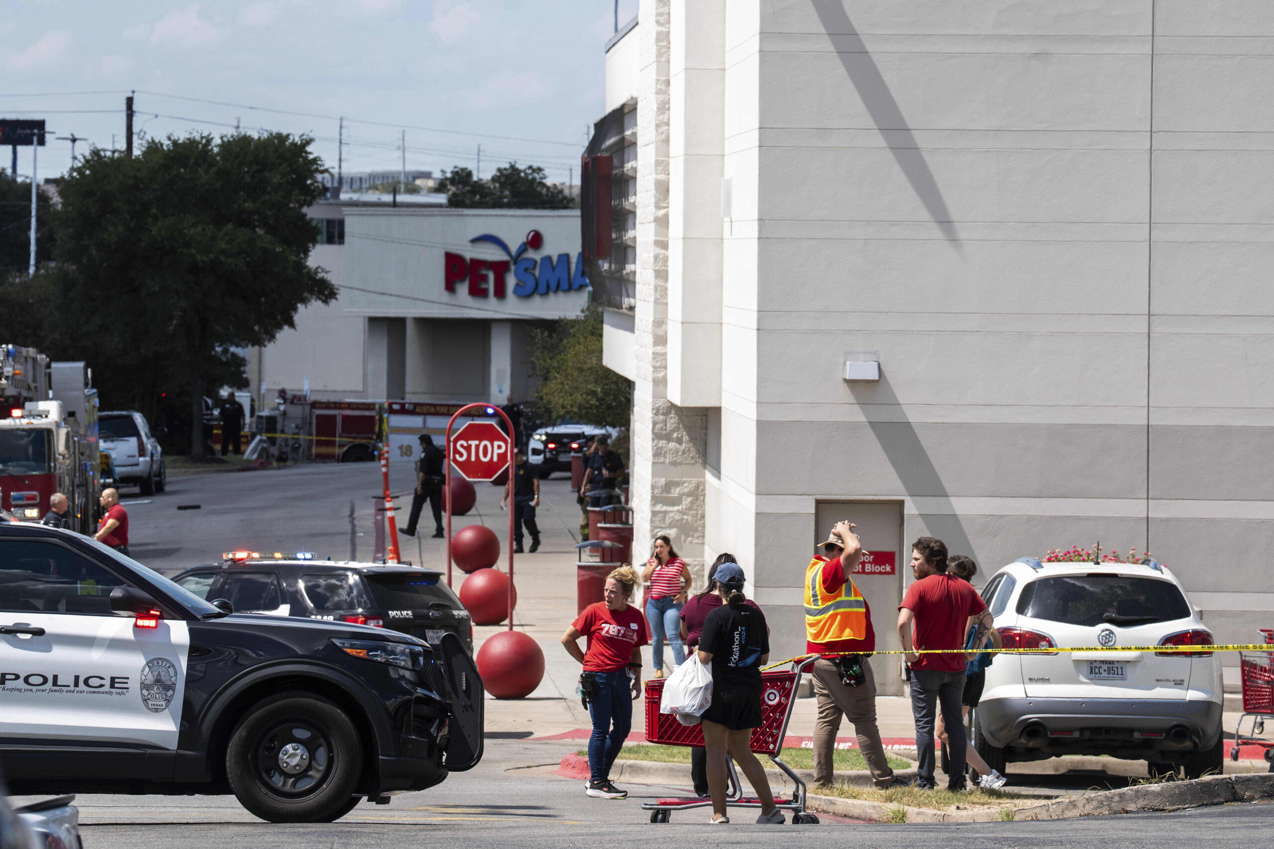 Law enforcement investigates a shooting at Target off Research Boulevard,...