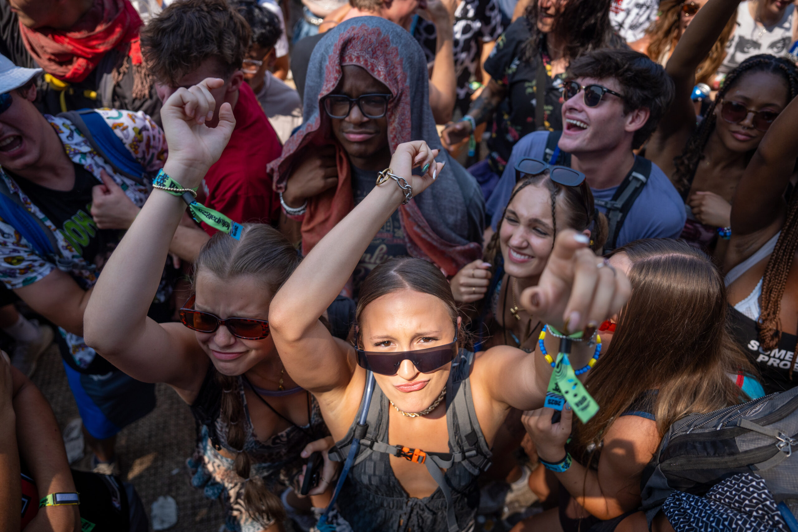 People dance to Layz during the third day of Lollapalooza...