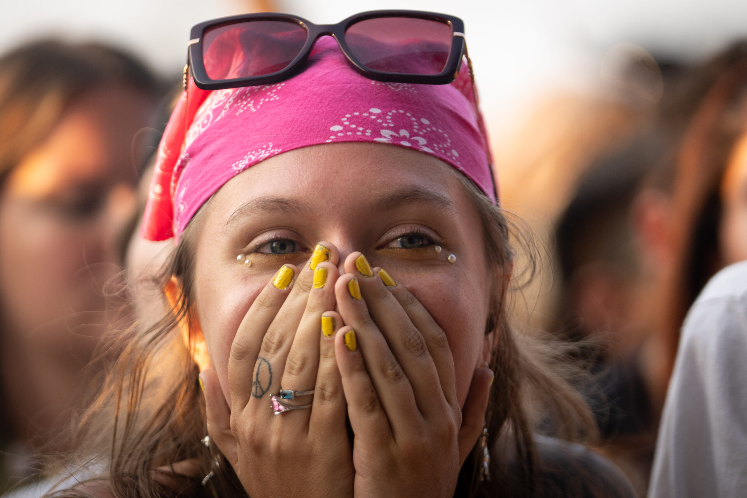 A fan cries as Doechii performs on the third day...