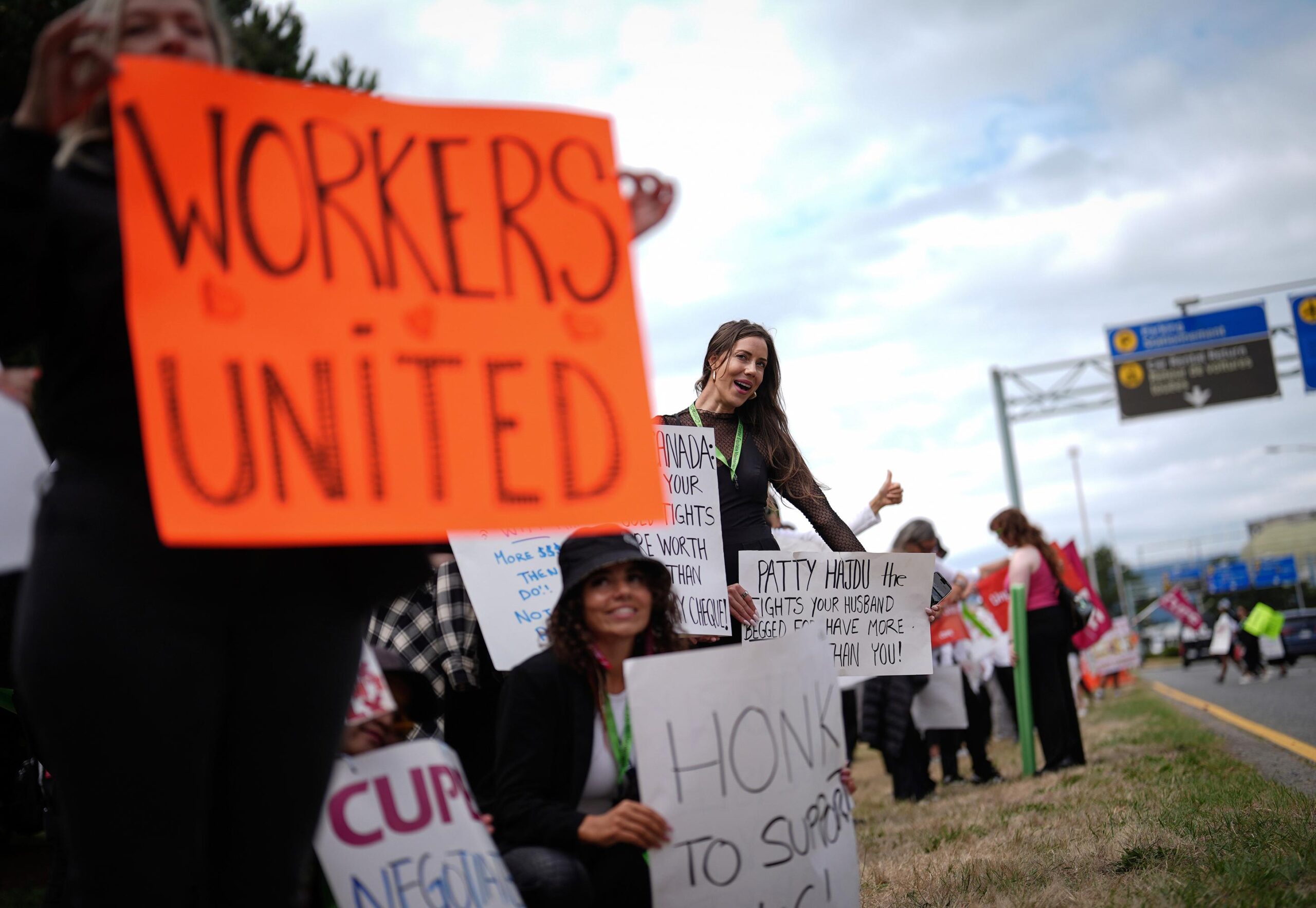 Striking Air Canada flight attendants rally at Vancouver International Airport,...