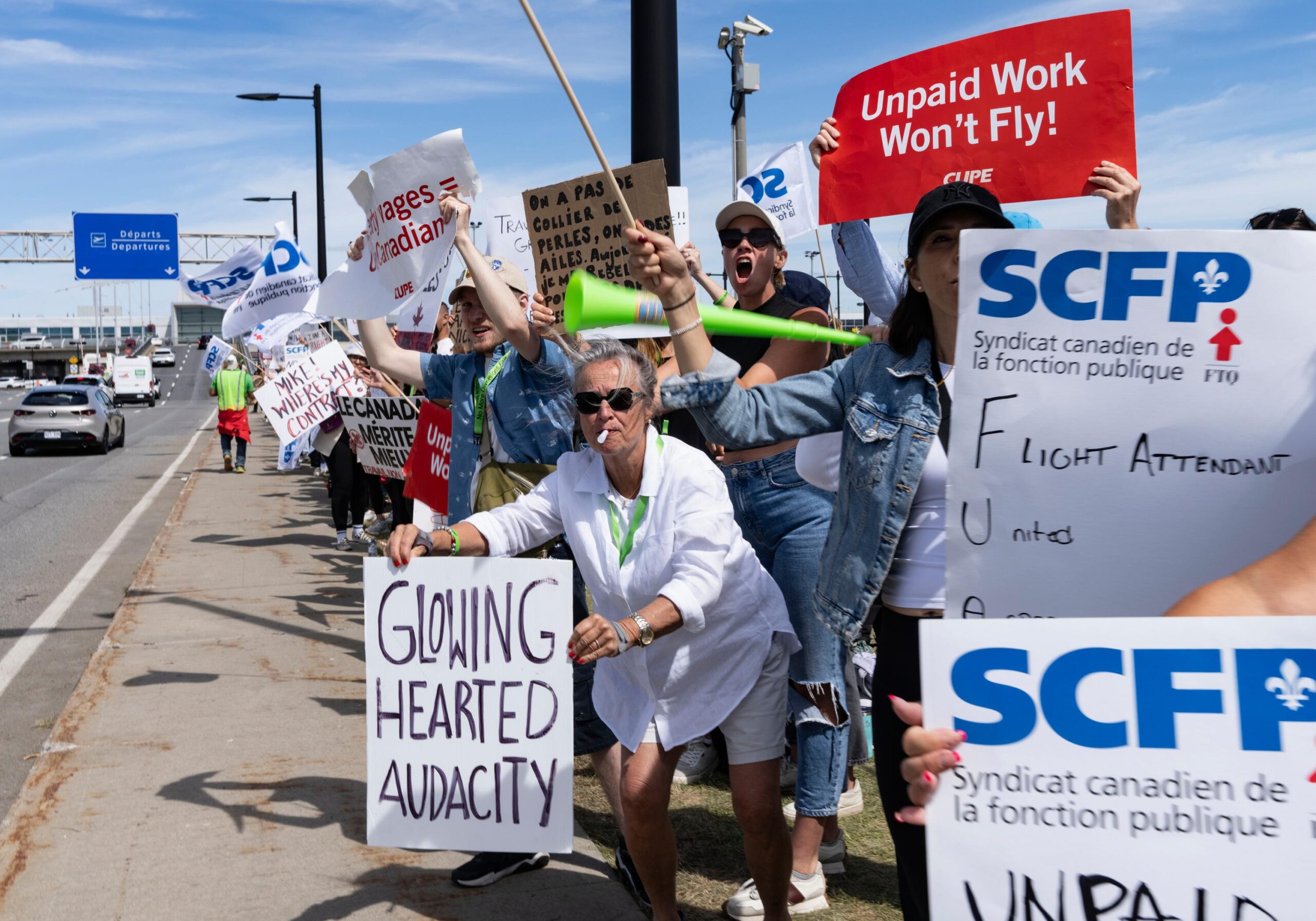 Air Canada flight attendants and supporters picket outside Montreal-Pierre Elliott...