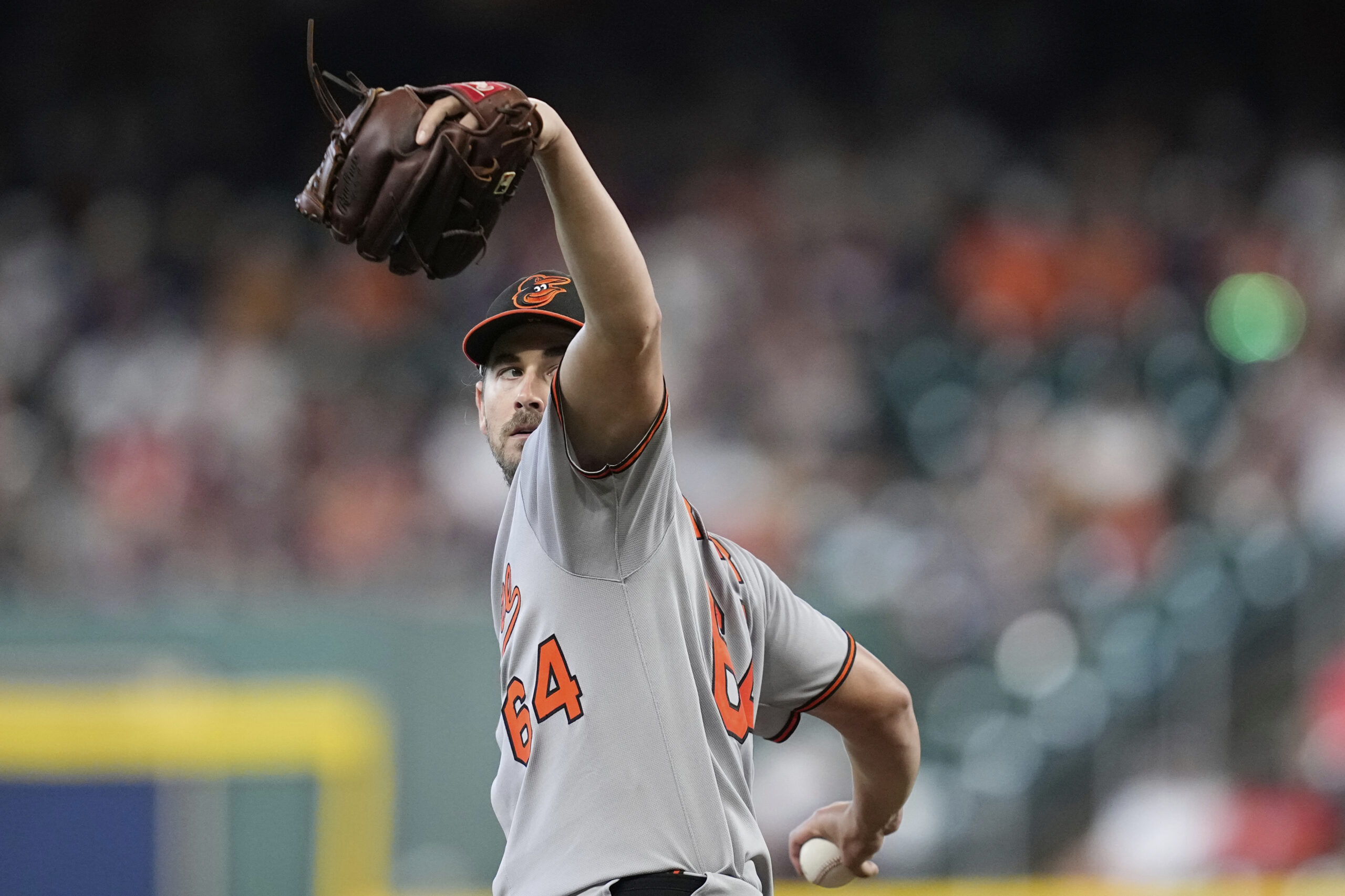 Baltimore Orioles starting pitcher Dean Kremer throws against the Houston...