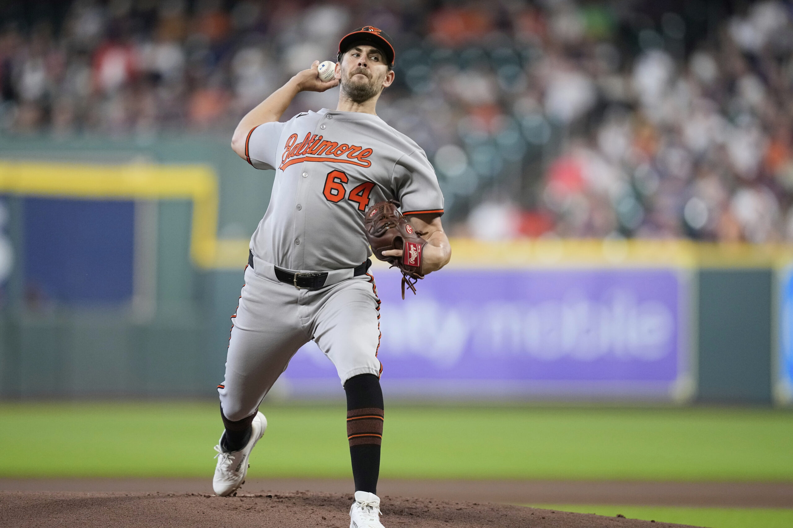 Baltimore Orioles starting pitcher Dean Kremer throws against the Houston...