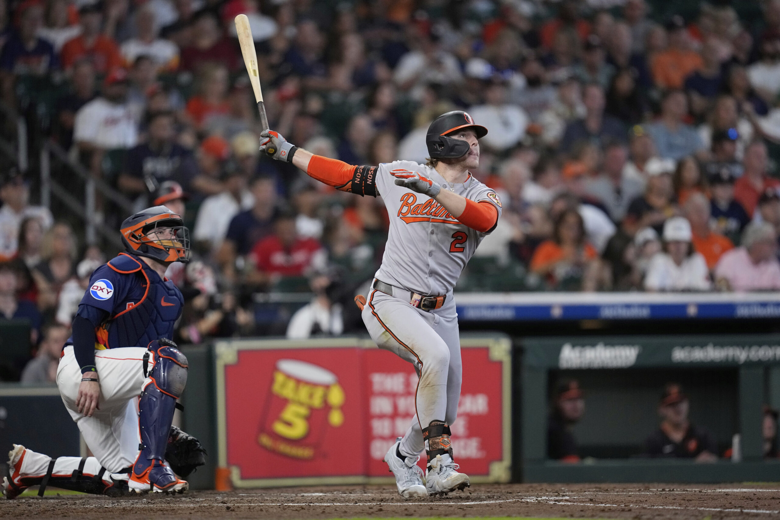 Baltimore Orioles' Gunnar Henderson (2) hits a sacrifice fly as...