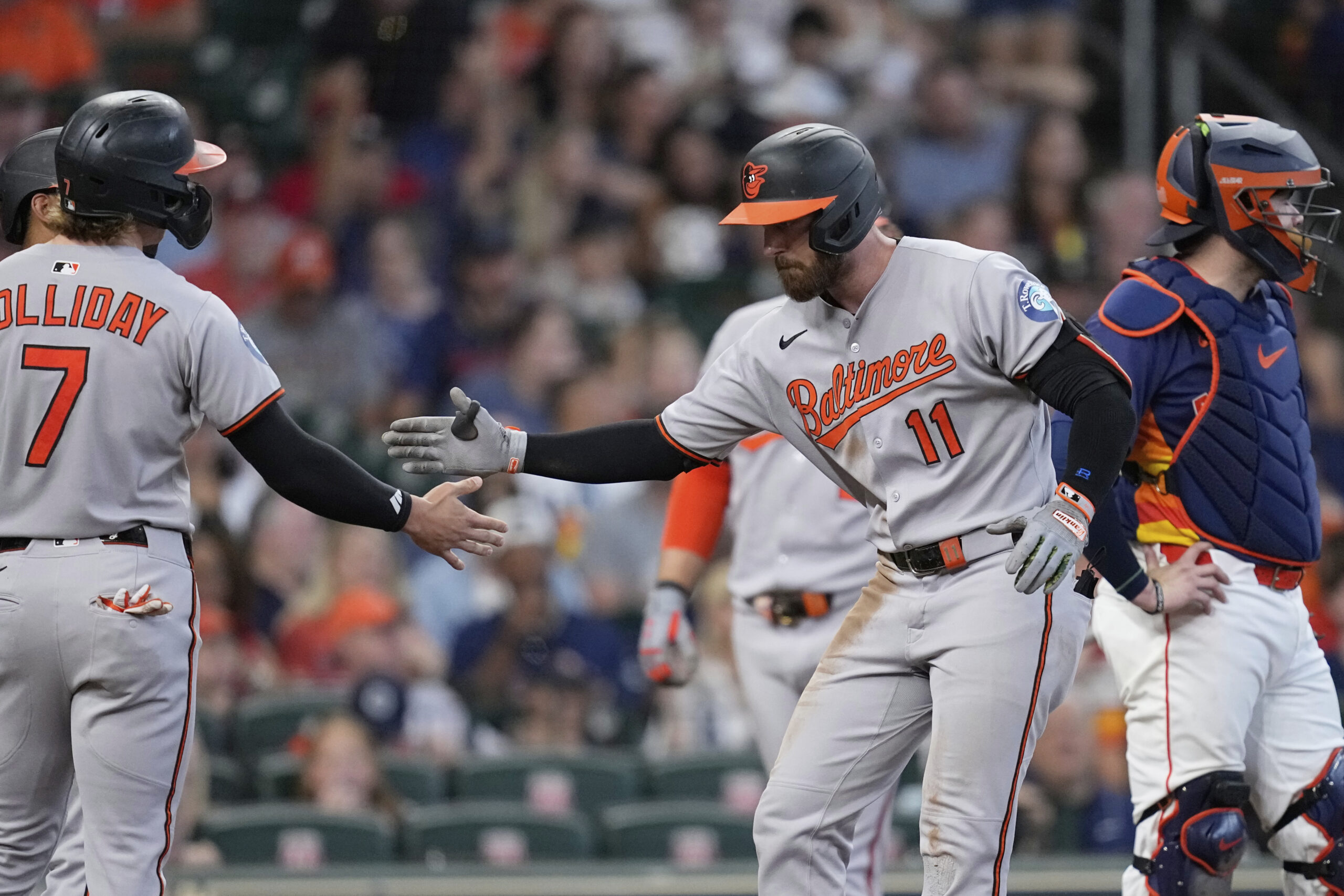 Baltimore Orioles' Jordan Westburg (11) celebrates with Jackson Holliday (7)...
