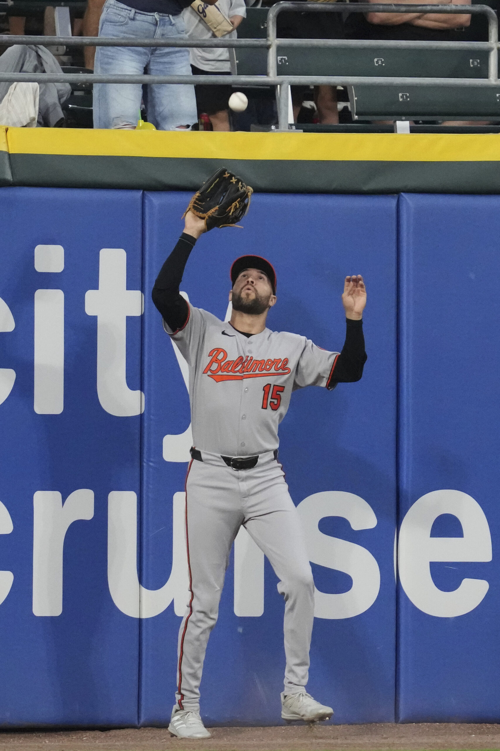 Baltimore Orioles left fielder Dylan Carlson catches a fly ball...