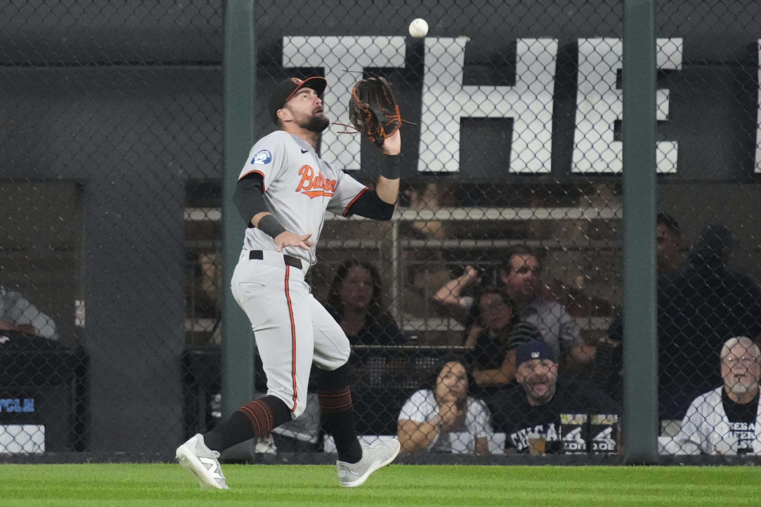 Baltimore Orioles center fielder Colton Cowser catches a fly ball...