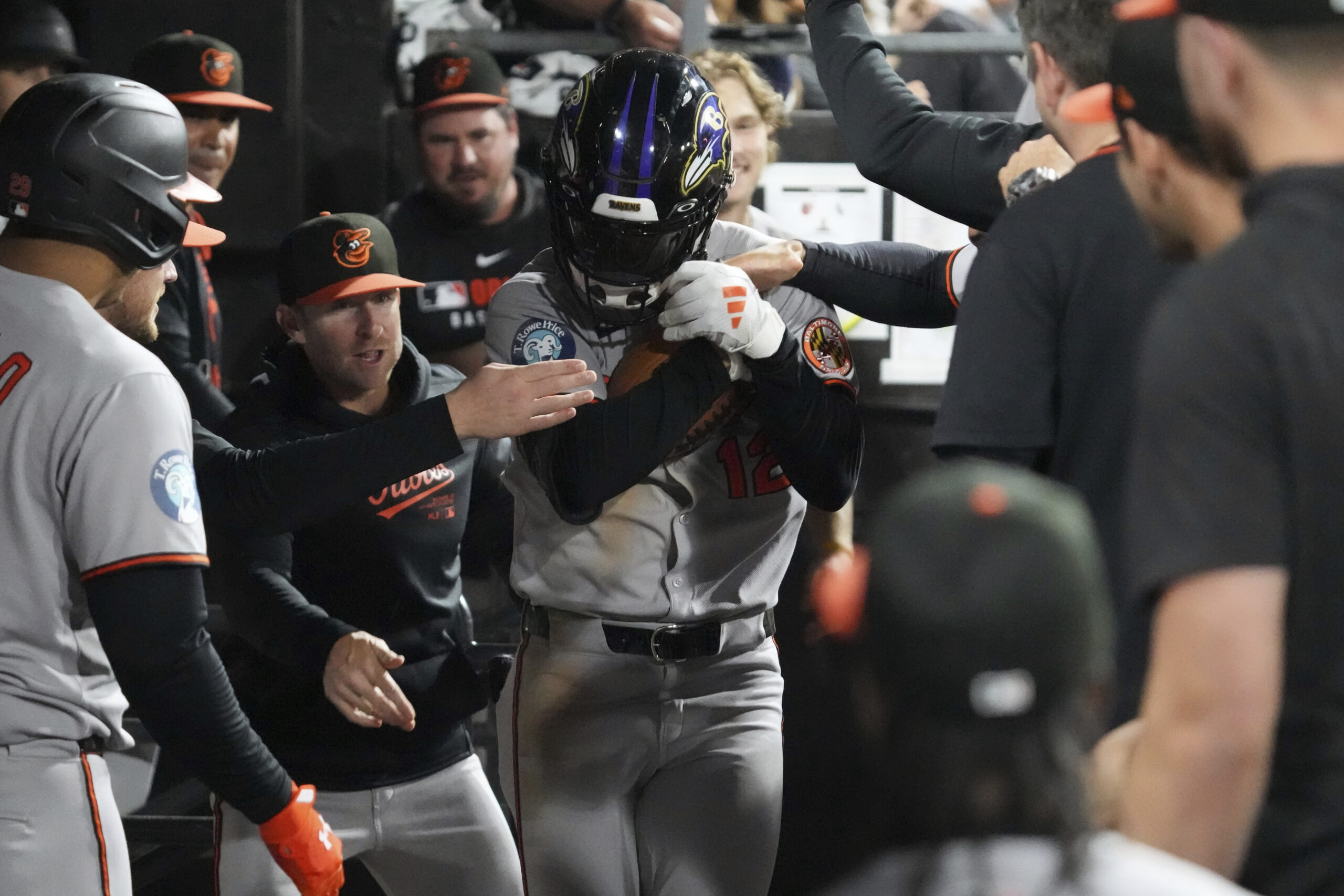 Baltimore Orioles' Dylan Beavers celebrates with teammates after hitting a...