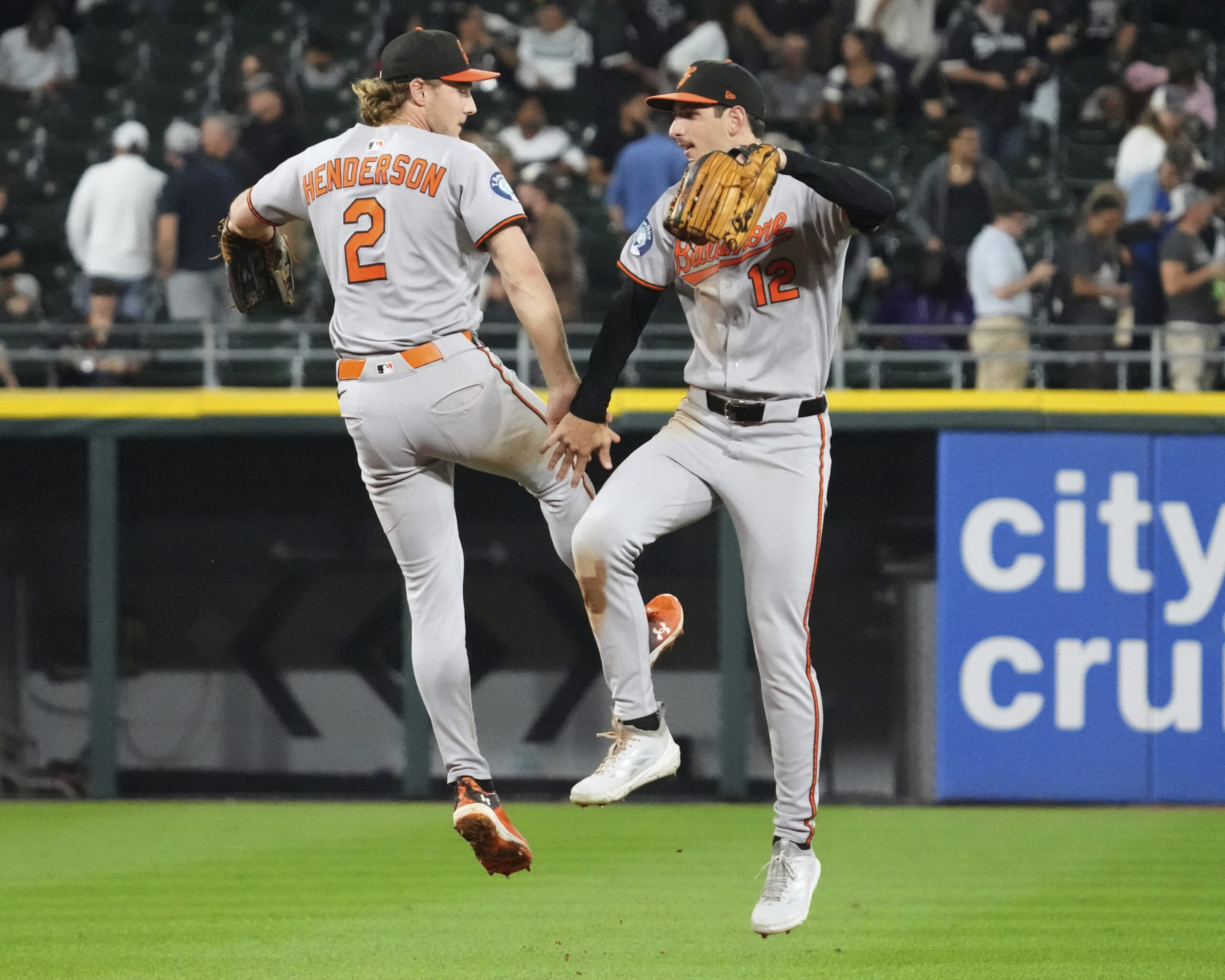 Baltimore Orioles' Gunnar Henderson, left, celebrates with Dylan Beavers after...