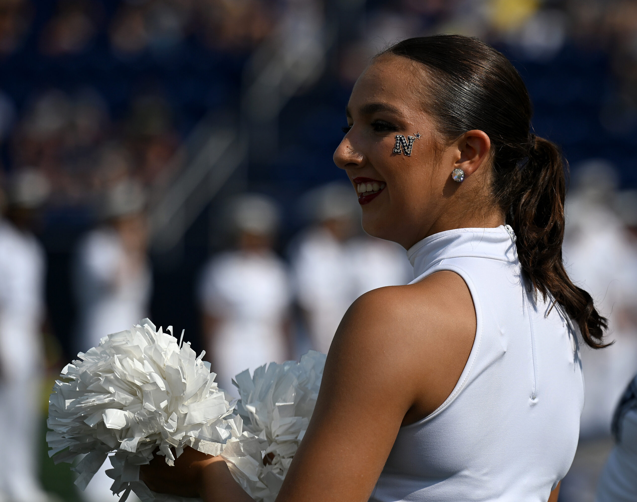 Members of the Navy Spirit Team before the game. The...