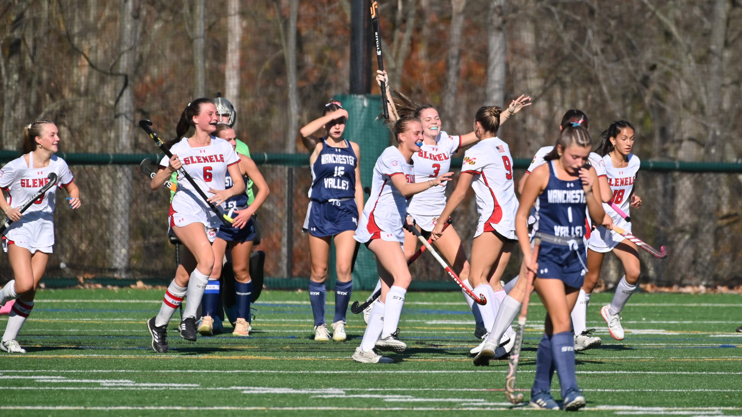 Glenelg players celebrate a second quarter goal against Manchester Valley...
