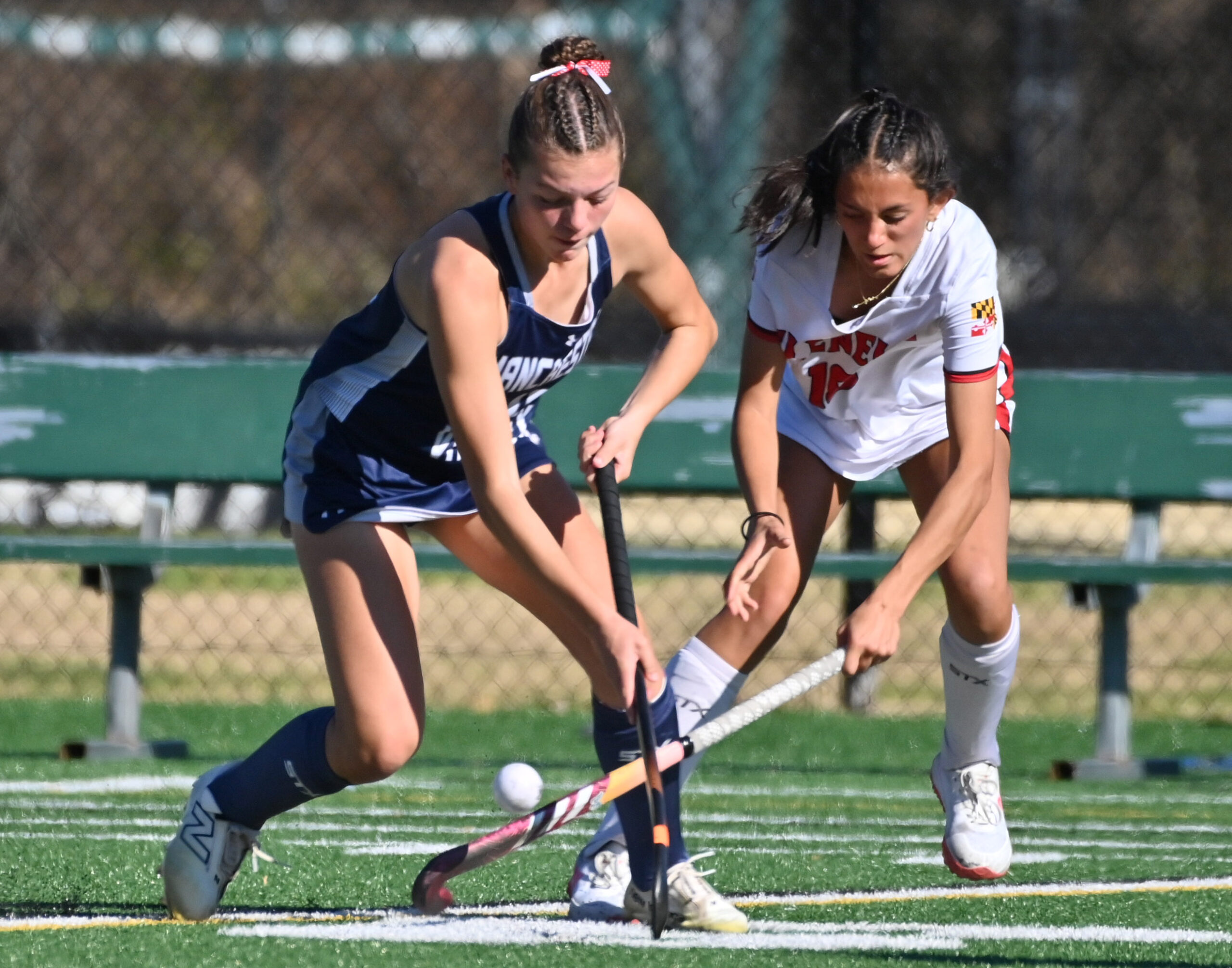 Manchester Valley's Bella Miller, left, and Glenelg's Lakshmi Almli battle...