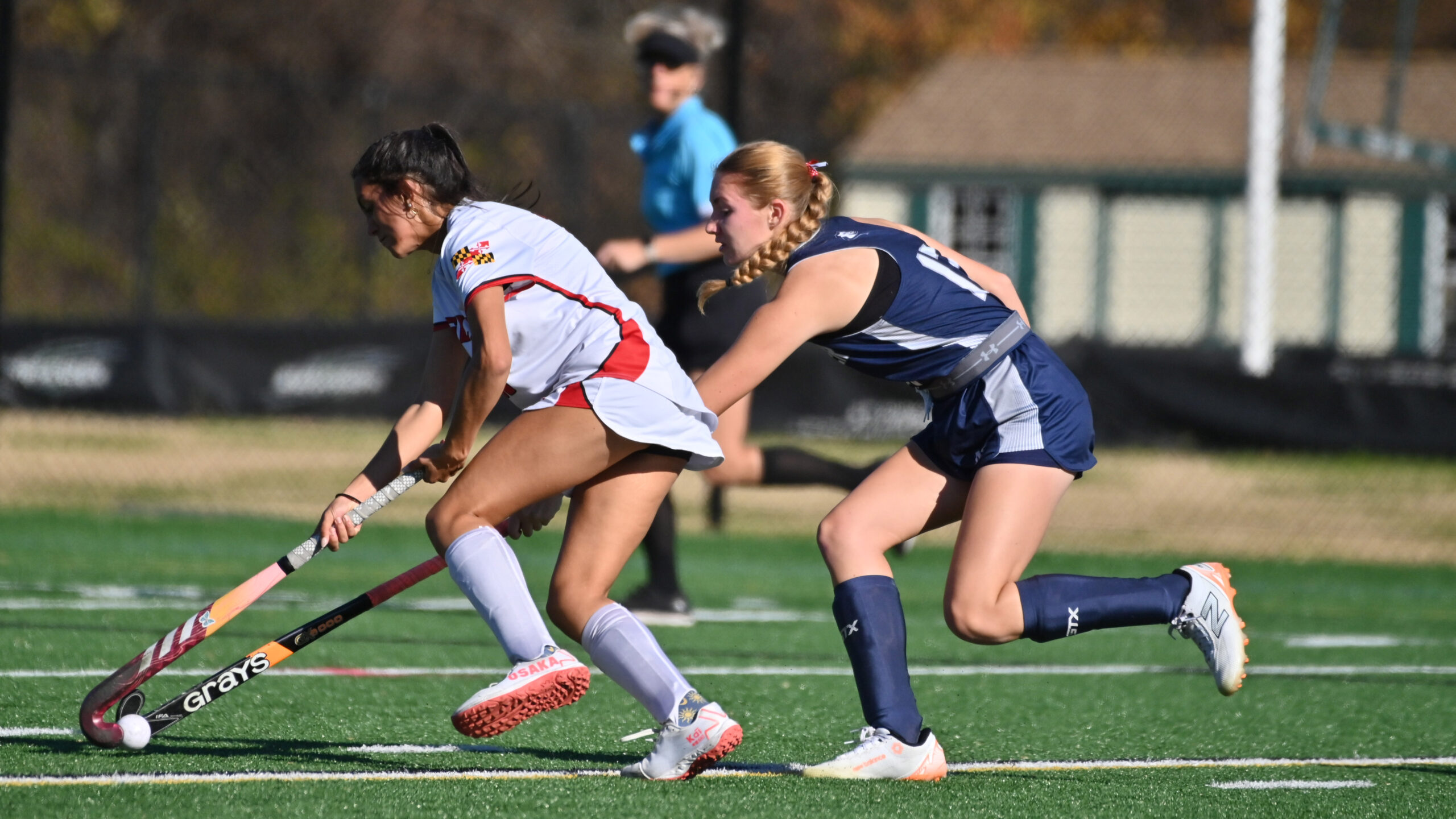 Manchester Valley's Brigid Carr, right, tries to take the ball...